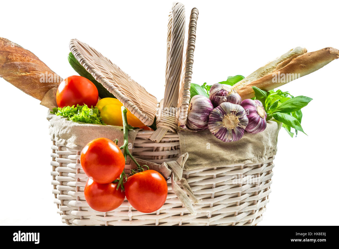 Basket full of fresh vegetables on white background Stock Photo - Alamy