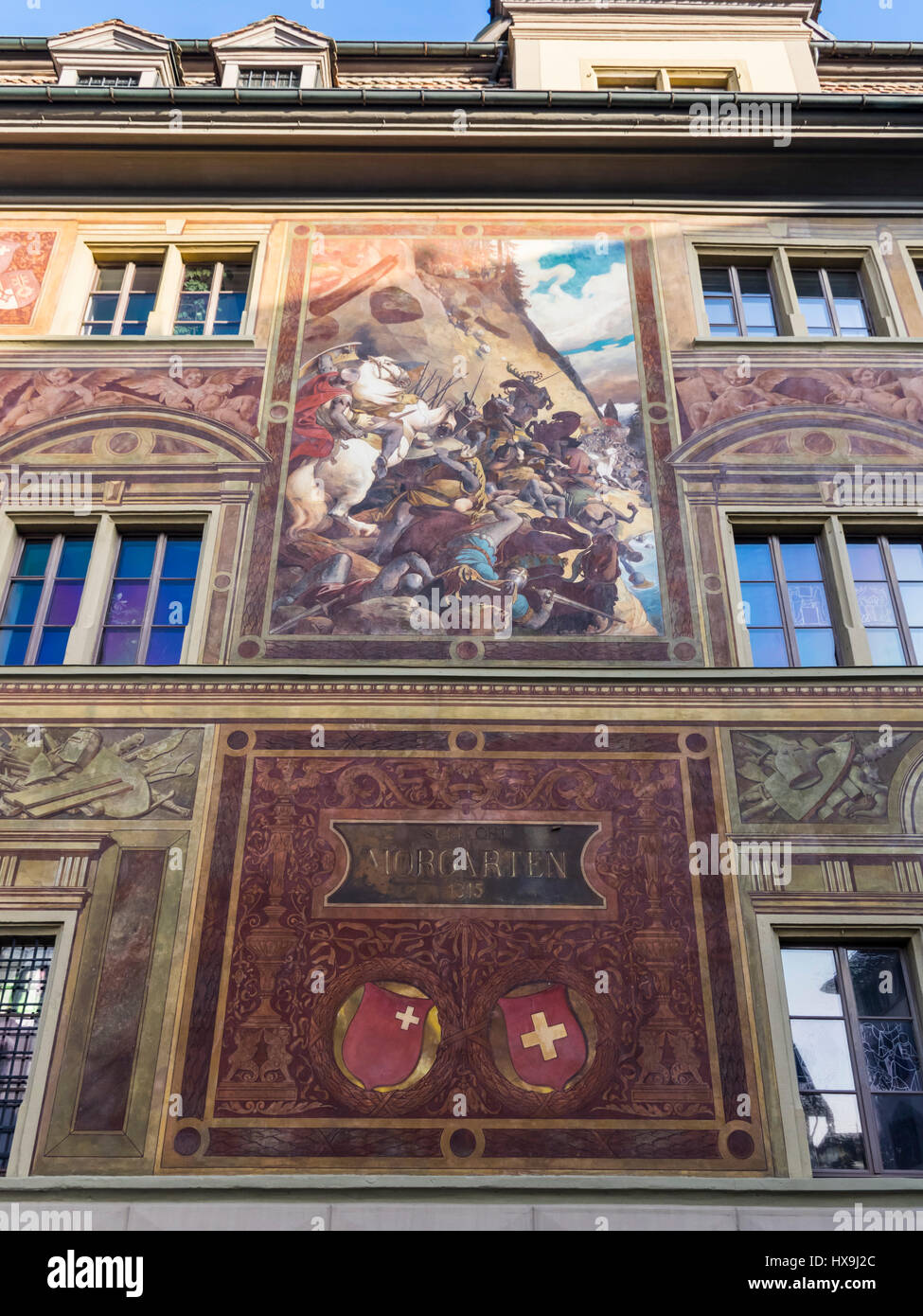 Mural on the town hall of Schwyz, Switzerland, of the battle of Morgarten (1315) between the Swiss confederates and the house of Habsburg/Austria. Stock Photo