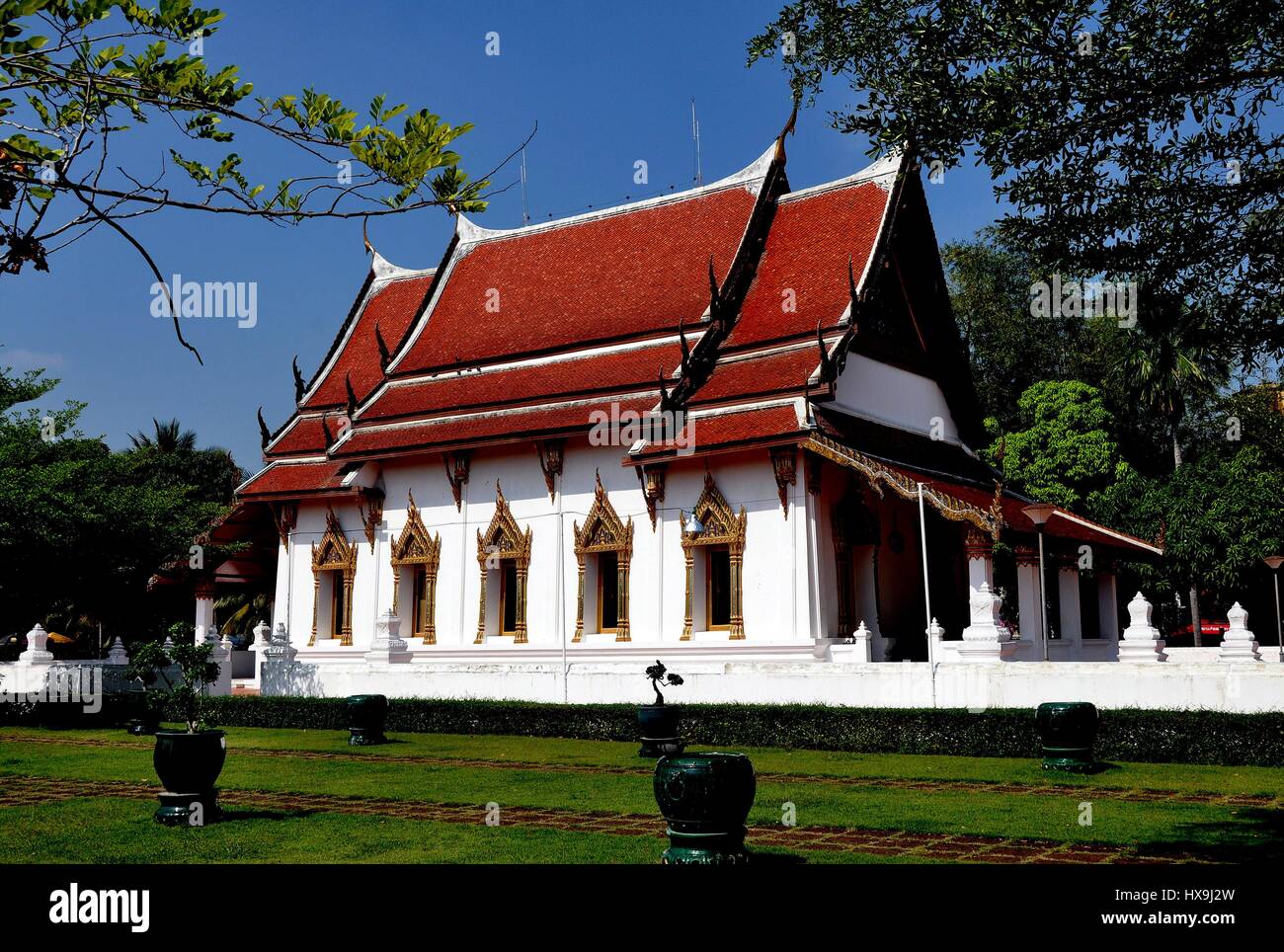Amphawa, Thailand - December 17, 2010:  Ubosot sanctuary at Wat Amphawa Chetiyaram, originally the home of King Rama III's mother,with gabled roofs, c Stock Photo
