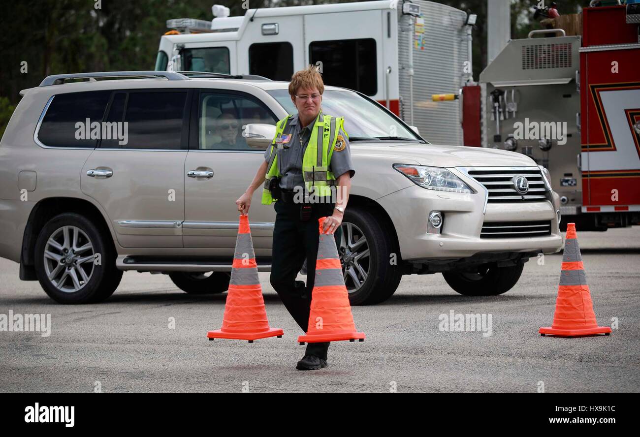 Florida, USA. 25th Mar, 2017. PBSO block traffic on the Beeline Highway