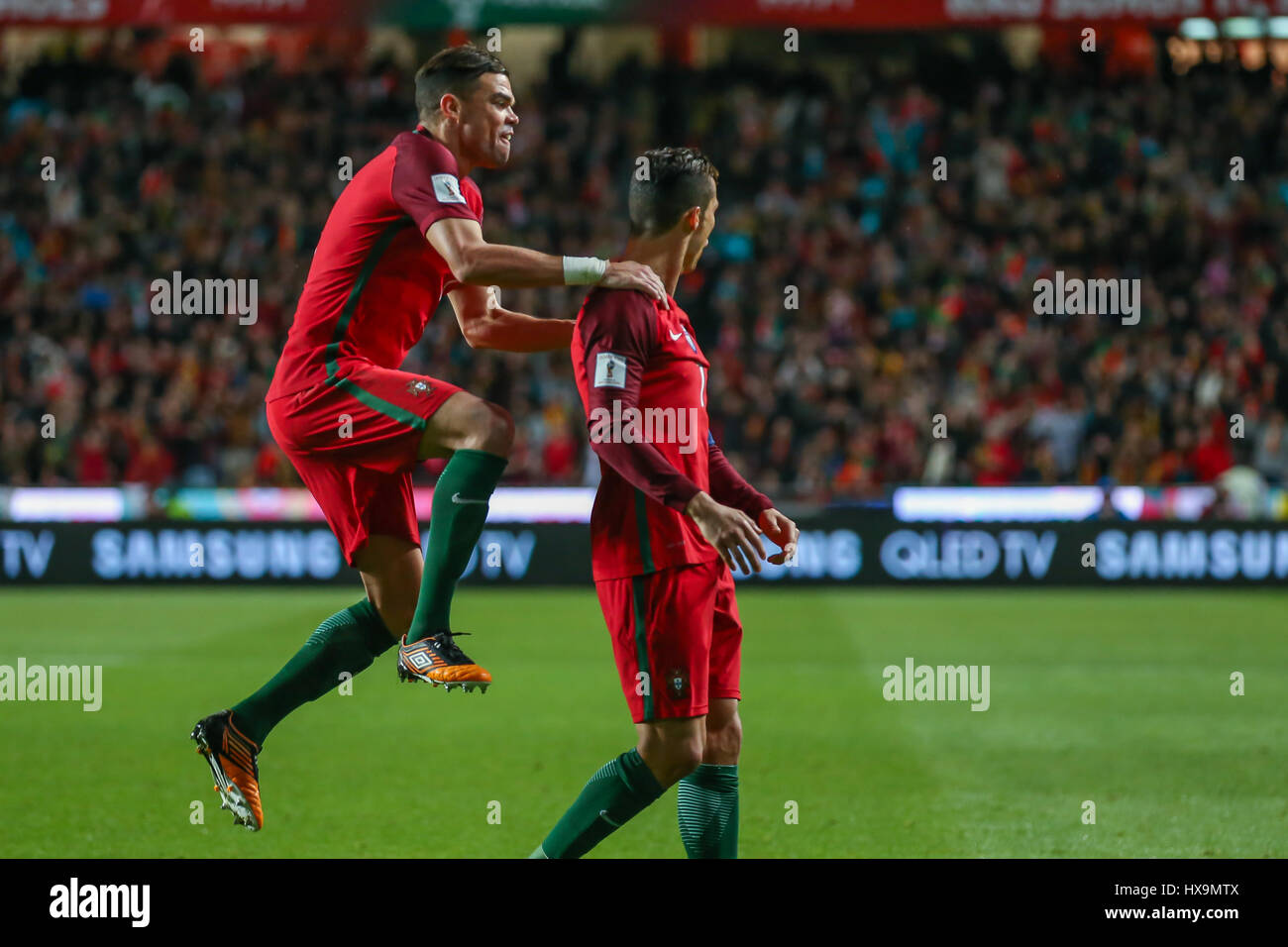 March 25, 2017. Lisbon, Portugal. Portugal's forward Cristiano Ronaldo (7) celebrating after scoring a goal with Portugal's defender Pepe (3) during the FIFA 2018 World Cup Qualifier between Portugal v Hungary Credit: Alexandre de Sousa/Alamy Live News Stock Photo