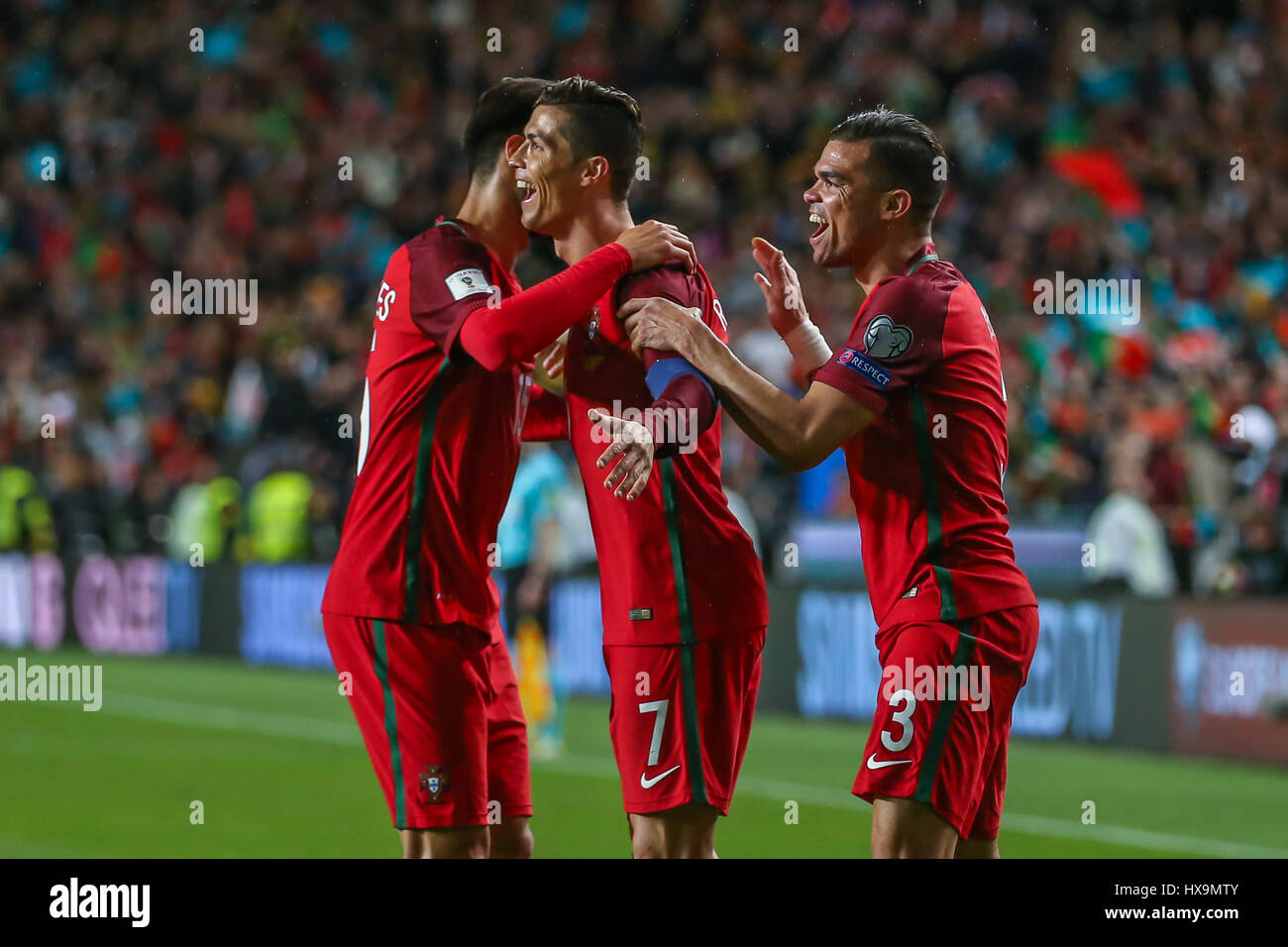 March 25, 2017. Lisbon, Portugal. Portugal's forward Cristiano Ronaldo (7) celebrating after scoring a goal with Portugal's defender Pepe (3) and Portugal's midfielder Andre Gomes (15) during the FIFA 2018 World Cup Qualifier between Portugal v Hungary Credit: Alexandre de Sousa/Alamy Live News Stock Photo