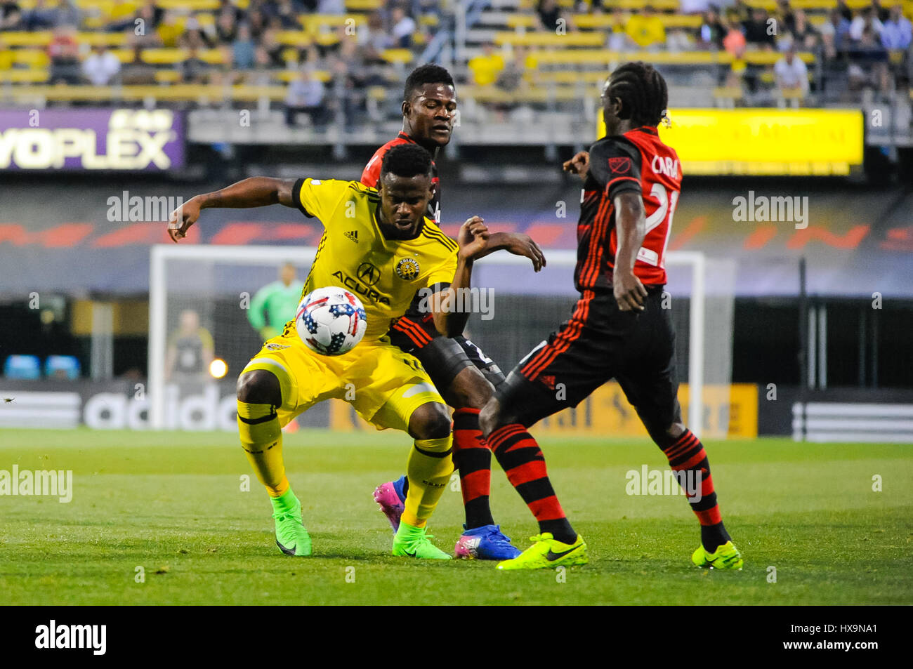Columbus, USA. 25th March 2017. Columbus Crew SC defender Waylon Francis (14) and Portland Timbers midfielder Diego Chara (21) battle for the ball in the second half of the match between Portland Timbers and Columbus Crew SC at MAPFRE Stadium, in Columbus OH. Saturday, March 25, 2017. Final Score - Columbus Crew SC 3 - Portland Timbers 2 .Photo Credit: Dorn Byg/CSM/Alamy Live News Stock Photo