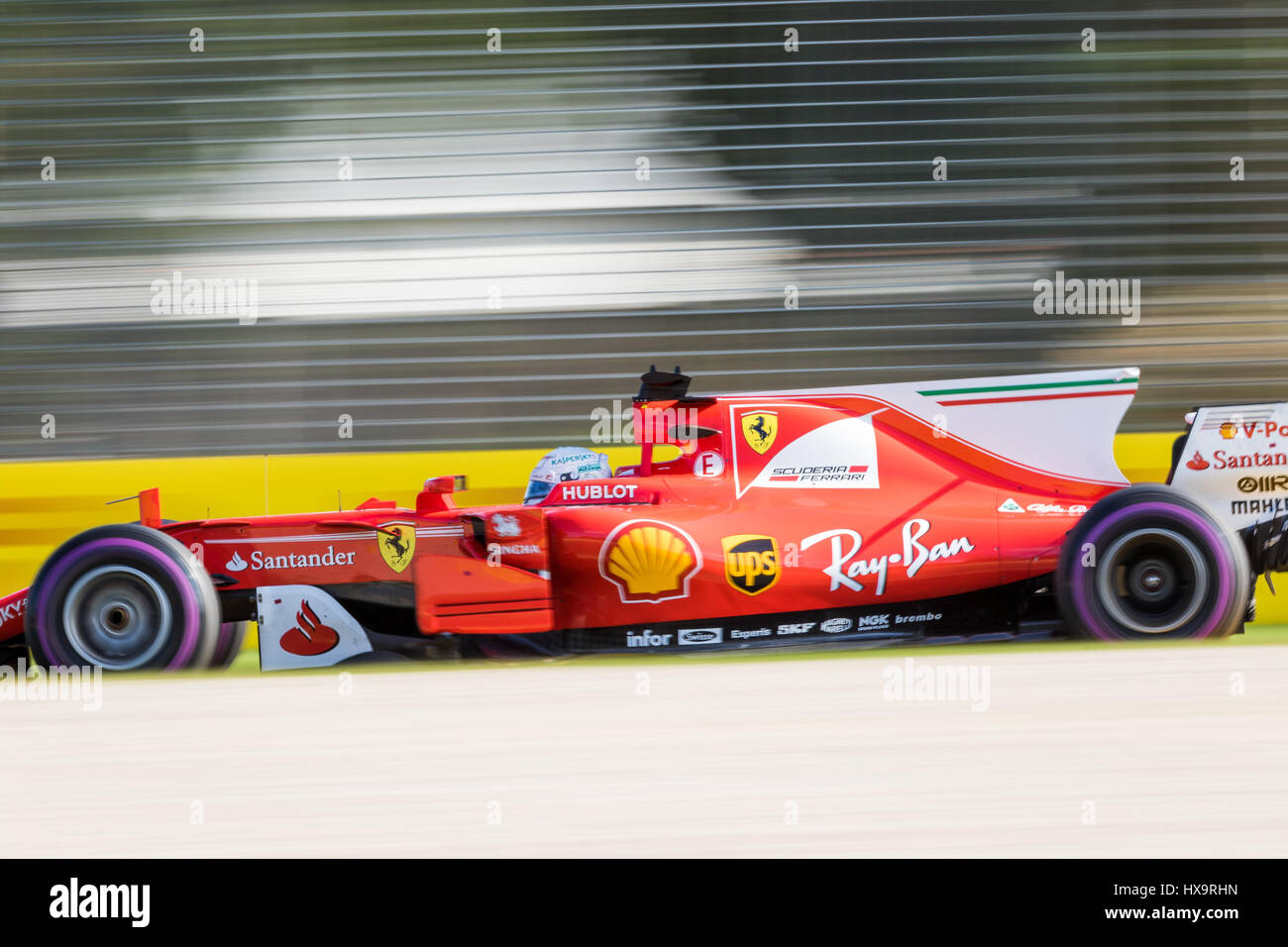 The podium (L to R): Sebastian Vettel (GER) Ferrari, second The podium (L to R): Sebastian Vettel (GER) Ferrari, second