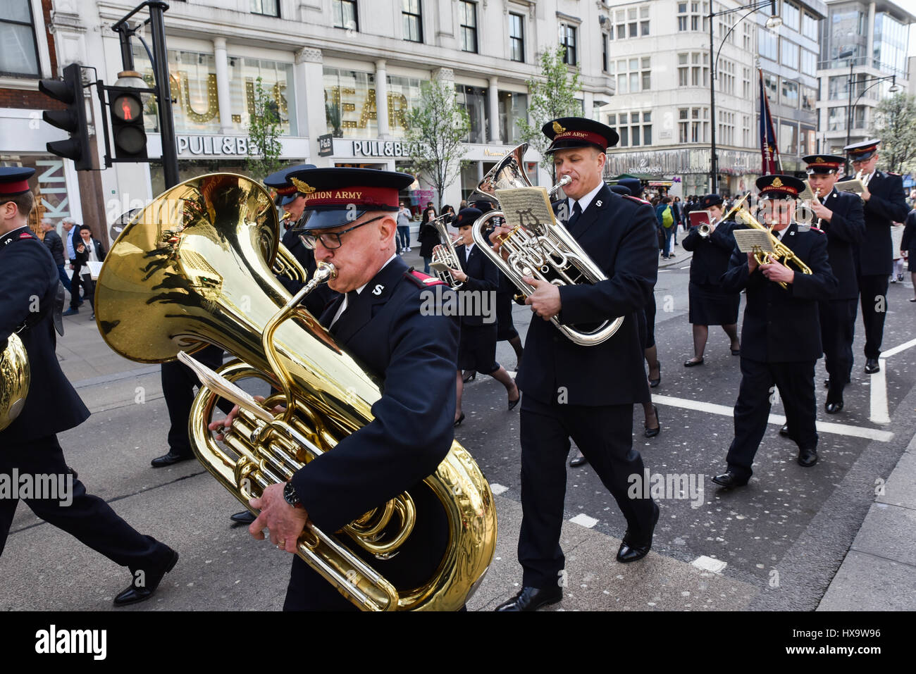 Oxford Street, London, UK. 26th Mar, 2017. The Salvation Army brass band marches down Oxford