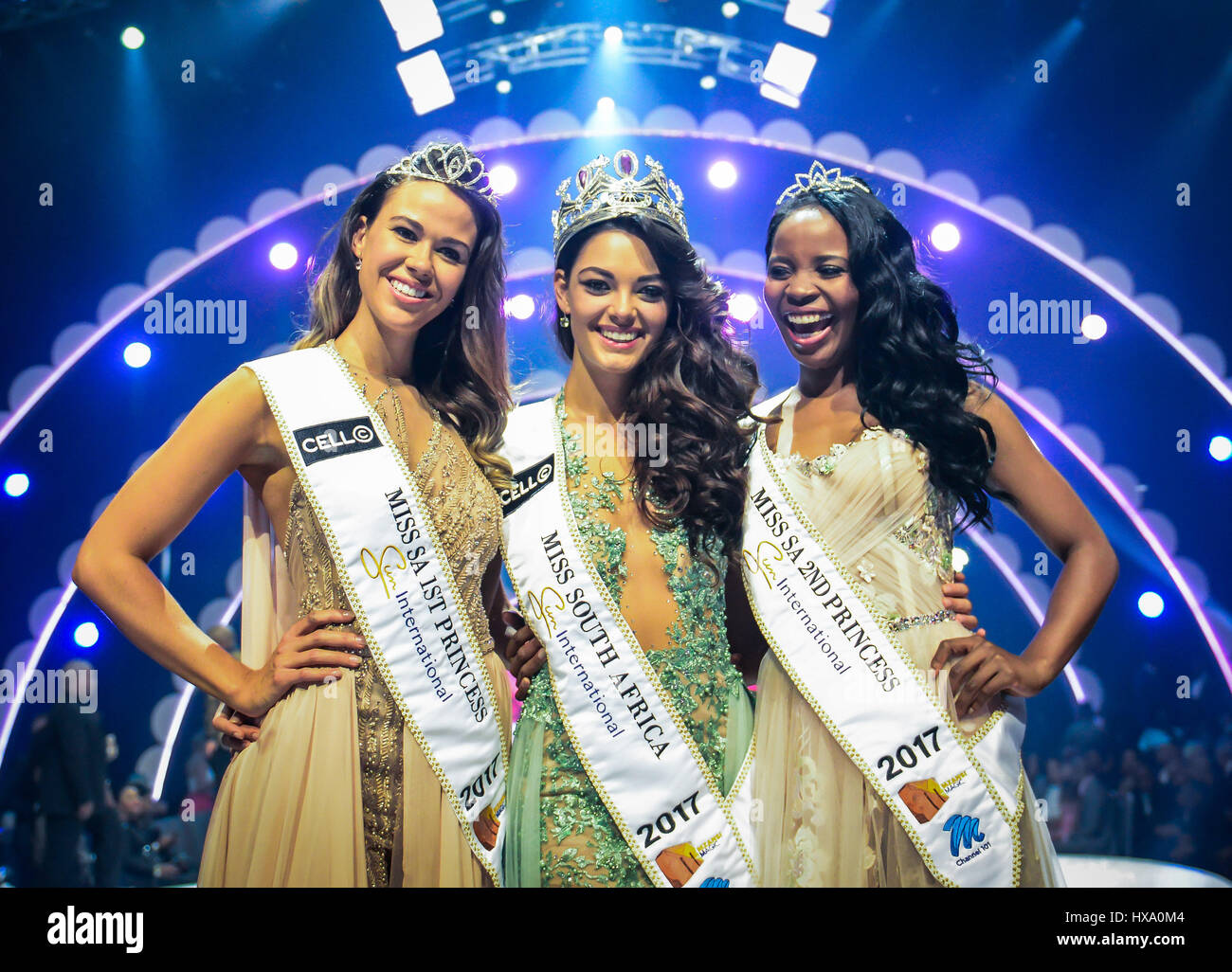 (170326) -- SUN CITY (SOUTH AFRICA), March 26, 2017 (Xinhua) -- The first prize winner Demi-Leigh Nel-Peters (C), the first runner-up Ade van Heerden (L) and the second runner-up Boipelo Mabe pose for photos during the?Miss?South?Africa?2017 Pageant and Celebration in Sun City, North West Province,?South?Africa, on March 26, 2017. The?Miss?South?Africa?2017 Pageant and Celebration was held here Sunday. Demi-Leigh Nel-Peters from Sedgefield in the Western Cape Province, a 21-year-old part-time model, was crowned?Miss?South?Africa?2017 with a prize of one million rand (about 80,000 US dollars), Stock Photo