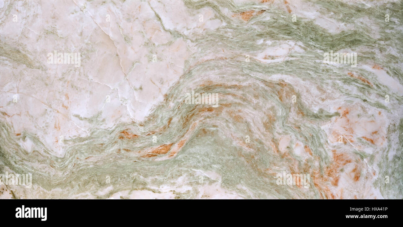 Light onyx tile with green and orange weaves. Background texture for design. Stock Photo