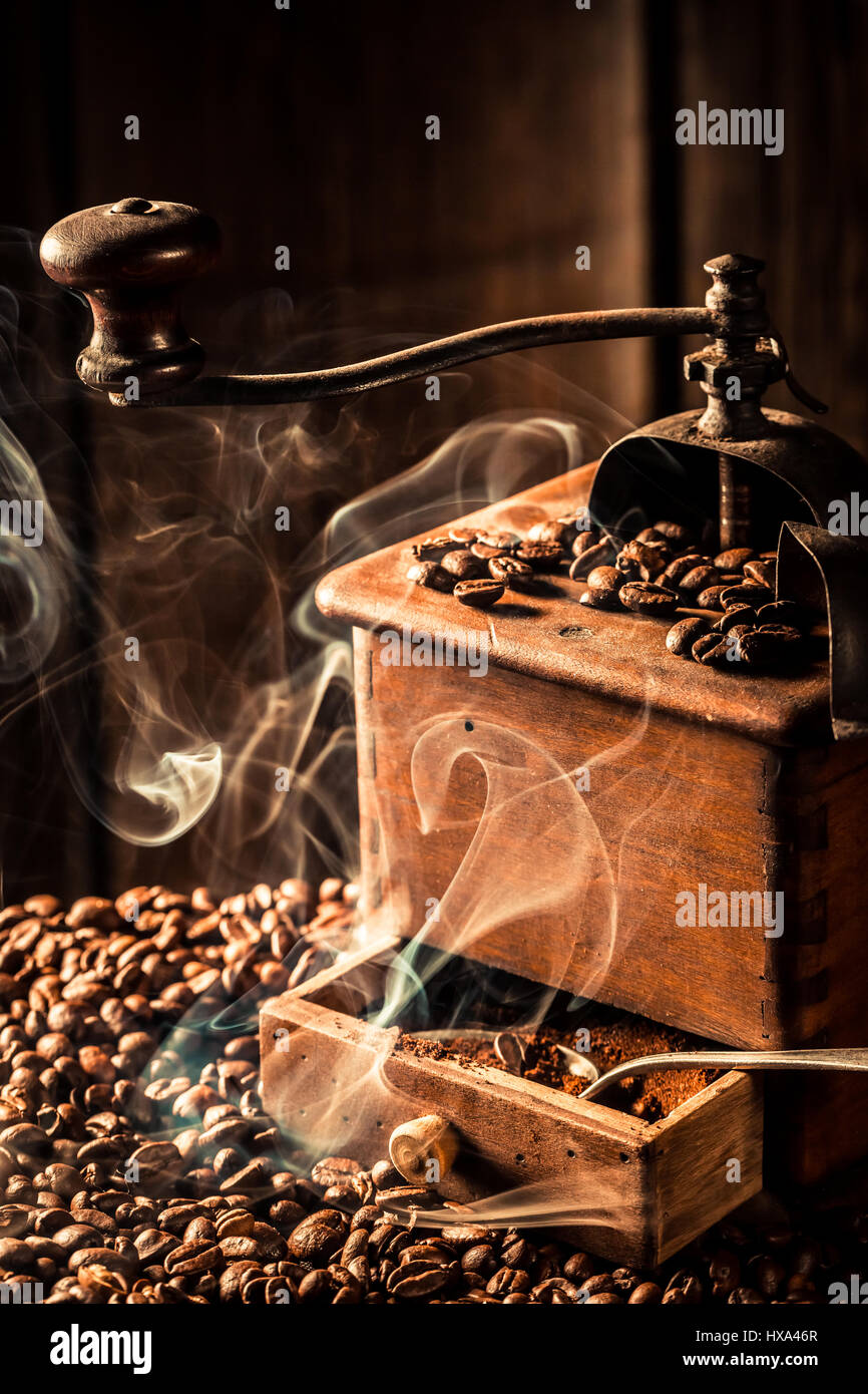 Aroma of fresh ground coffee on dark background Stock Photo - Alamy