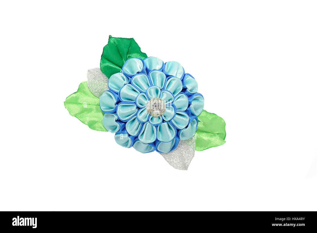Kanzashi.Beautiful blue artificial flower with brocade, isolated on white background Stock Photo