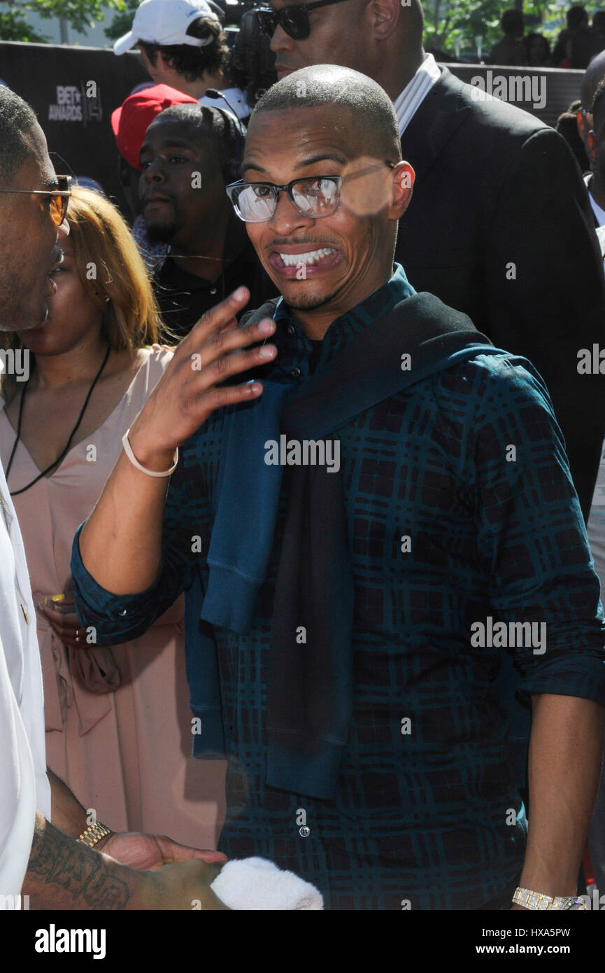 Rapper T.I. attends the BET AWARDS '14 red carpet at Nokia Theatre L.A ...