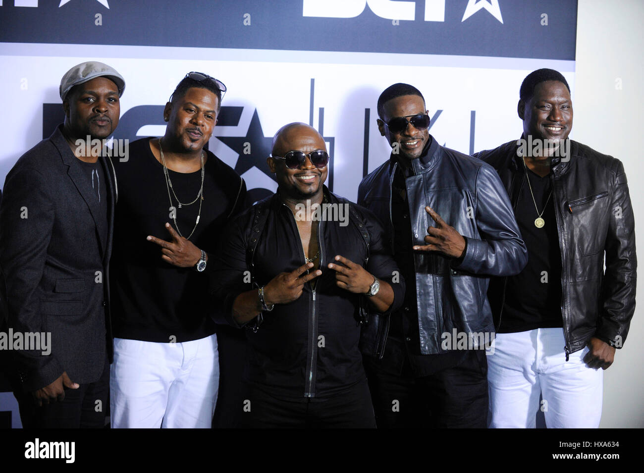 Singer Gary Jenkins (C) and other members of Silk pose in the press