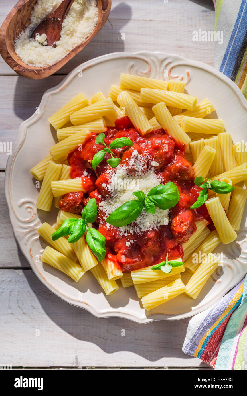 Homemade pasta penne with tomato sauce and basil Stock Photo - Alamy