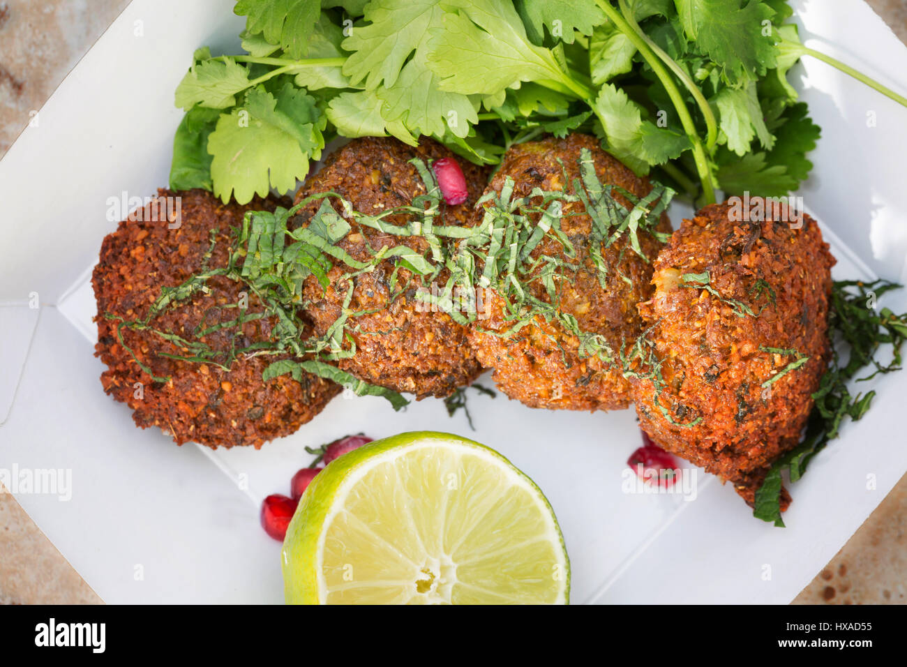 Vegetarian food - Falafel, lime and coriander Stock Photo