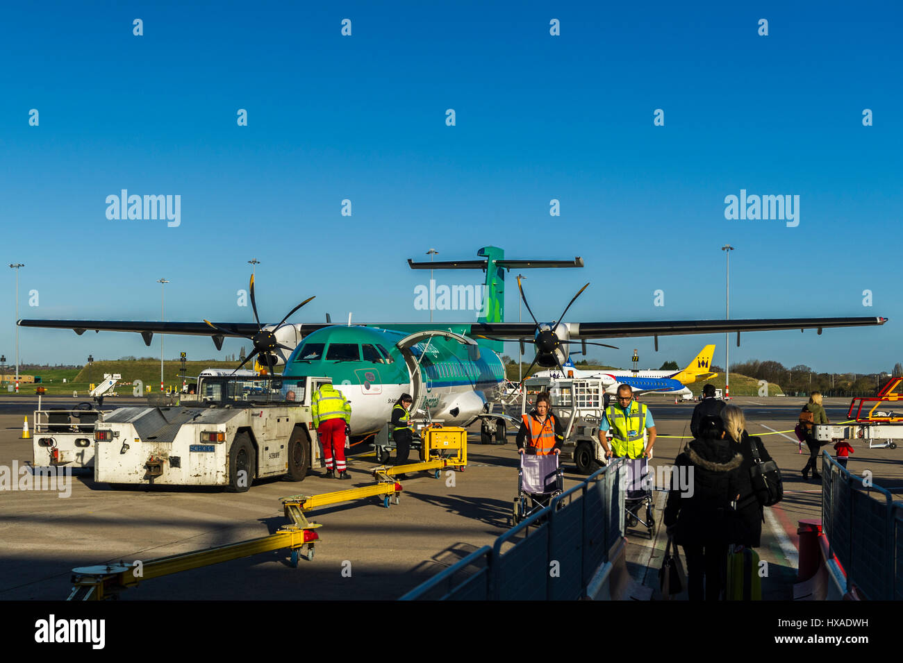 Aer Lingus ATR 72-600 registration EI-FNA operated by Stobart Air sits on the apron at Birmingham (BHX) ready to fly to Cork (ORK) in Ireland. Stock Photo