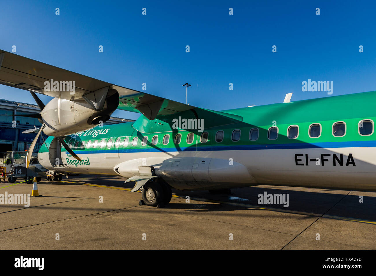 Aer Lingus ATR 72-600 registration EI-FNA operated by Stobart Air sits on the apron at Birmingham (BHX) ready to fly to Cork (ORK) in Ireland. Stock Photo