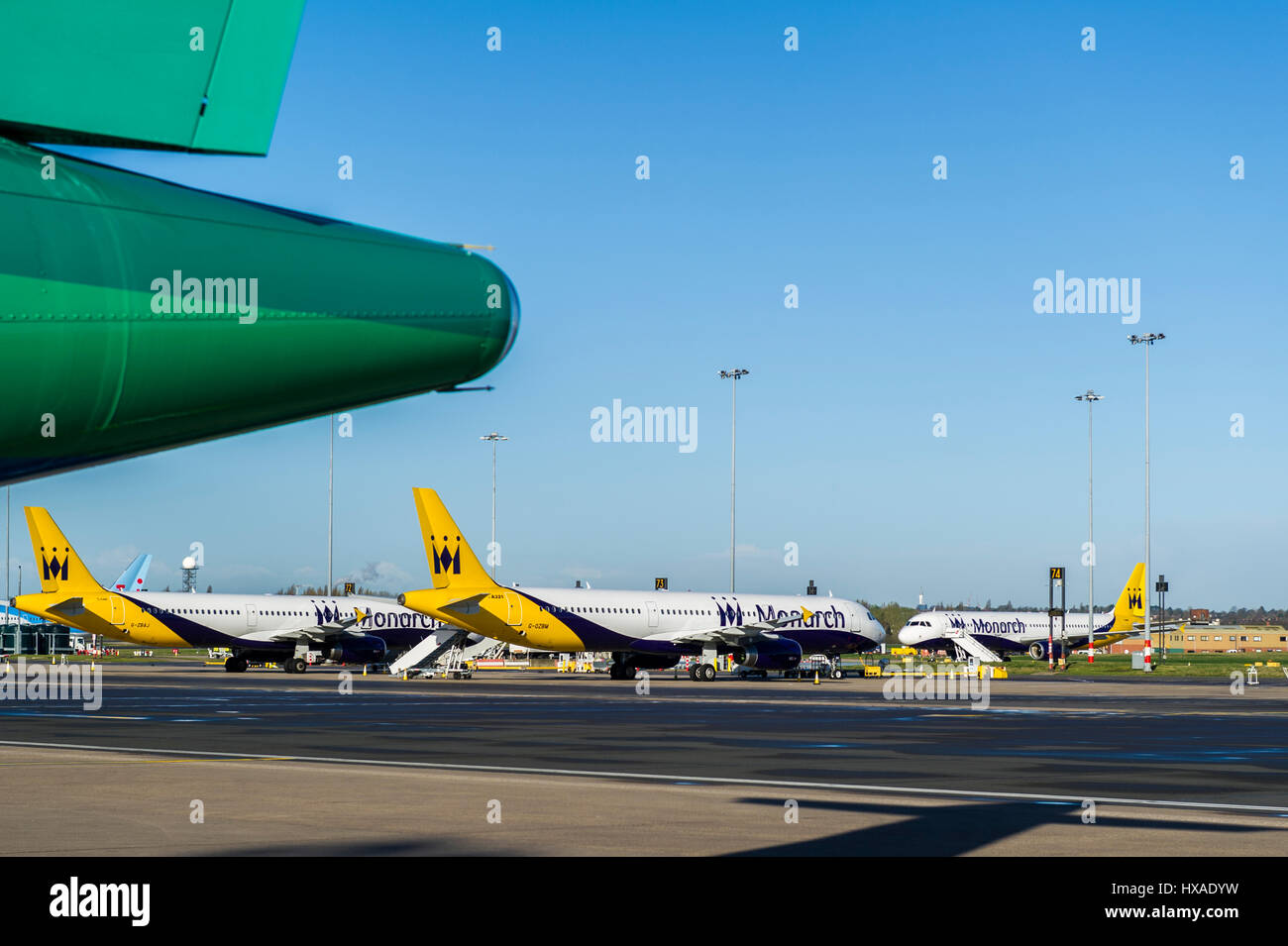 Monarch aircraft lined up at Birmingham Airport, UK. The airline has gone into administration which is the biggest ever UK airline failure. Stock Photo