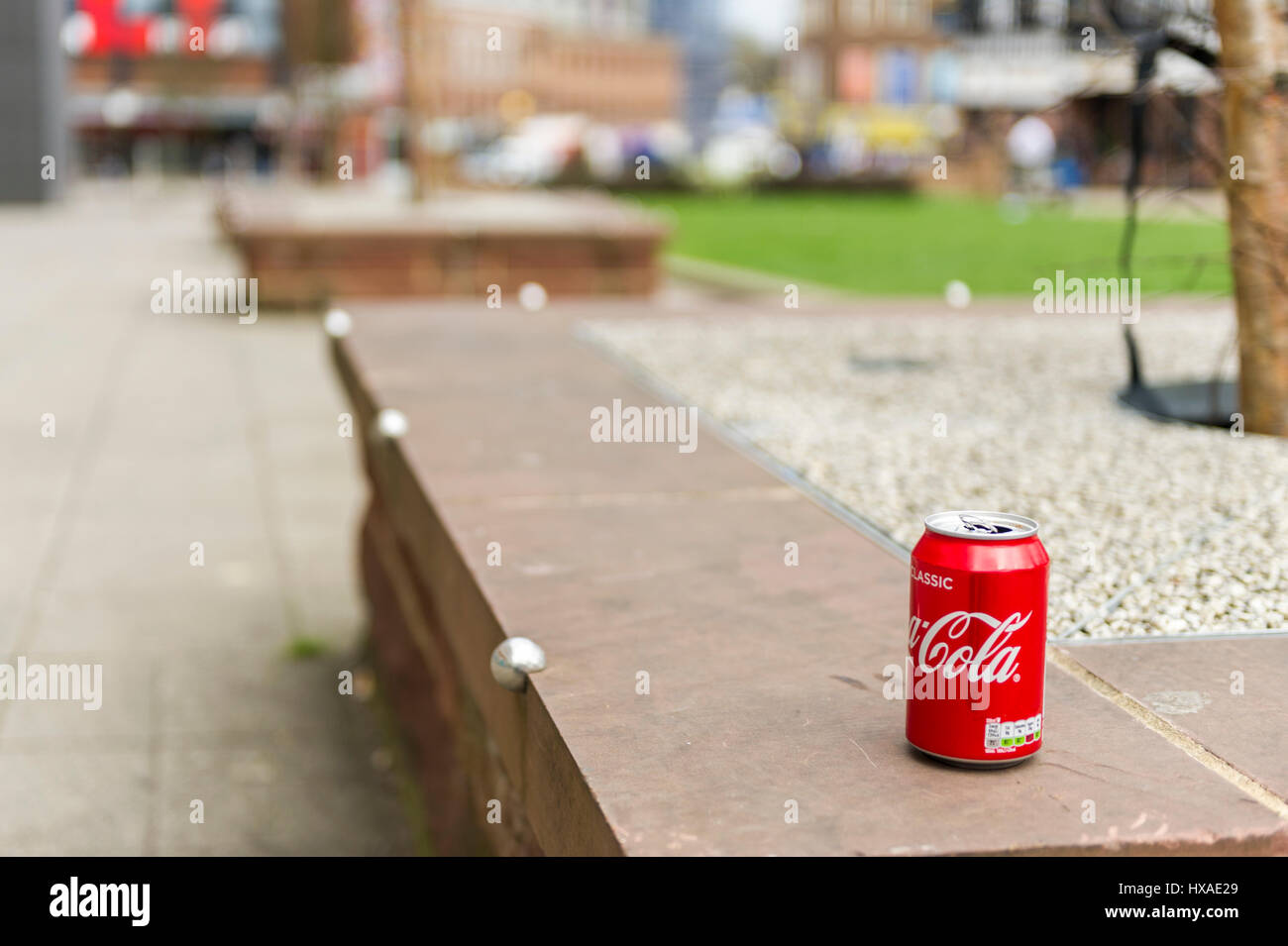 Empty Coca Cola can discarded, litter, in Coventry, United Kingdom. Stock Photo