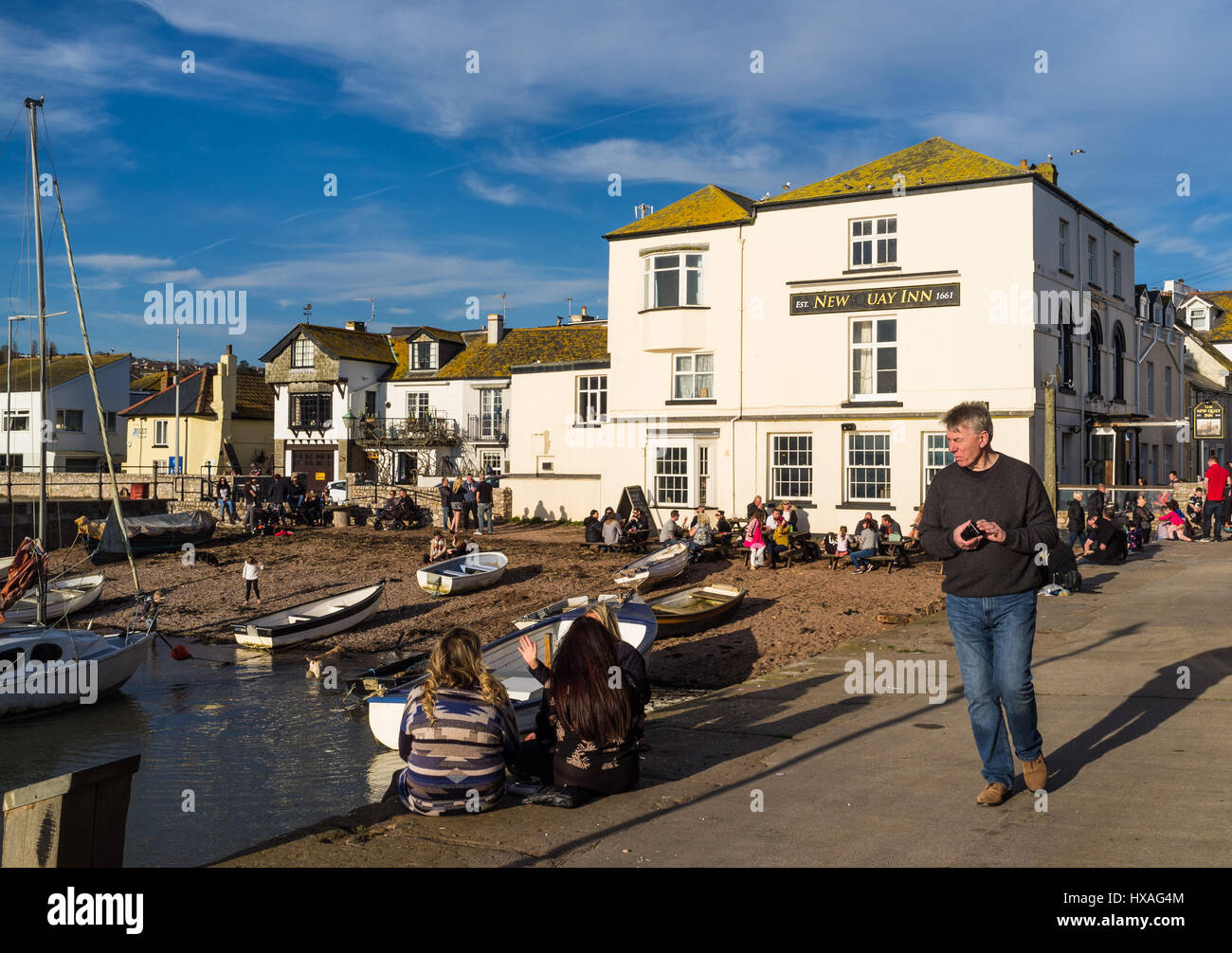 The New Quay public house at Teignmouth, Devon, with people drinking