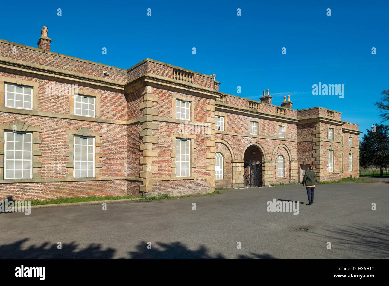 Disused Grade 2 listed stable block awaiting redevelopment at the site of former Kirkleatham Hall, Redcar Cleveland North Yorkshire Stock Photo