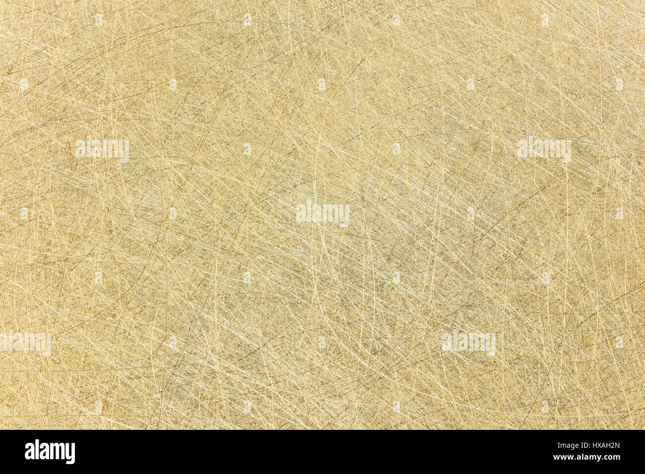 scratched brass surface background. highdetailed industrial metal