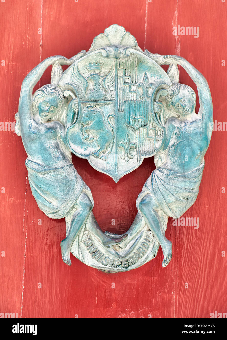 An old style decorative bronze door handles, the distinctive feature of