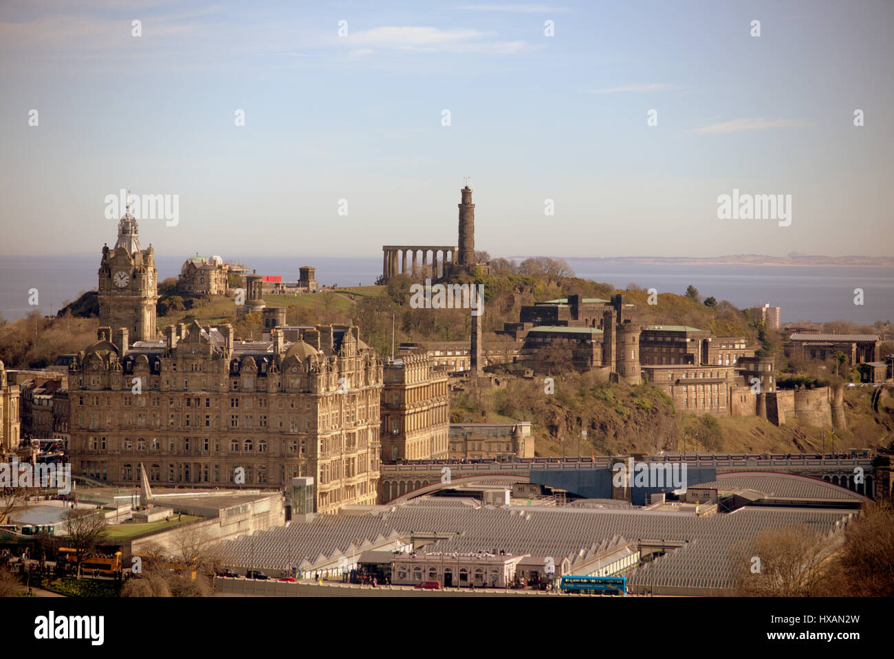 panoramic view of calton hill om a sunny day with waverley station in the foreground Stock Photo