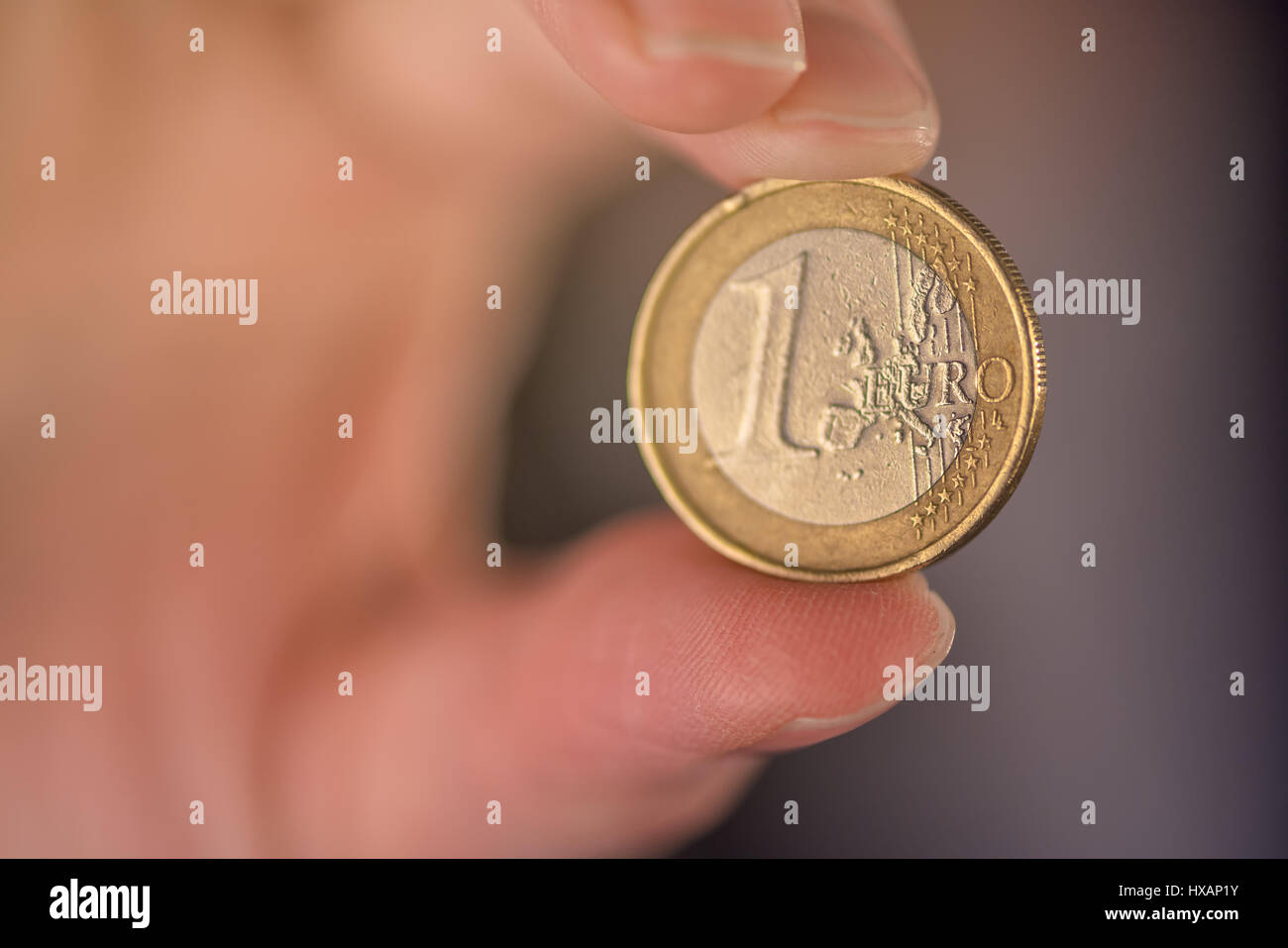 Businesswoman and one euro coin, business investment, money savings or financial trade concept, selective focus Stock Photo