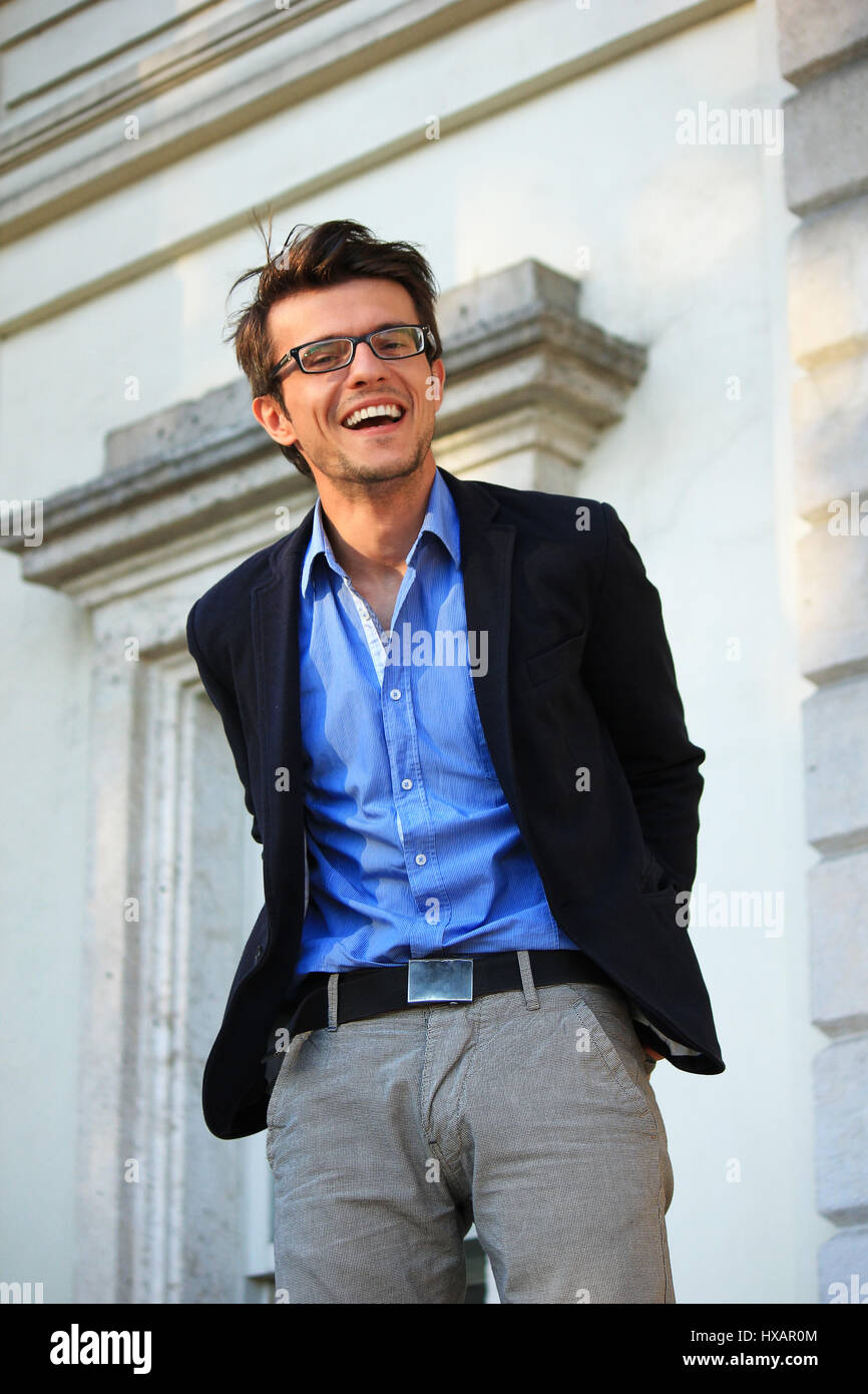 Successful handsome young businessman wearing glasses Stock Photo