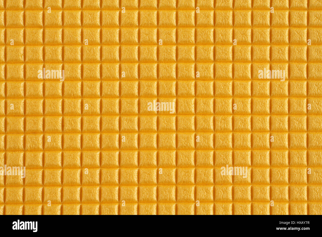 Yellow soft foamed polyethylene texture. Macro. Closeup Stock Photo