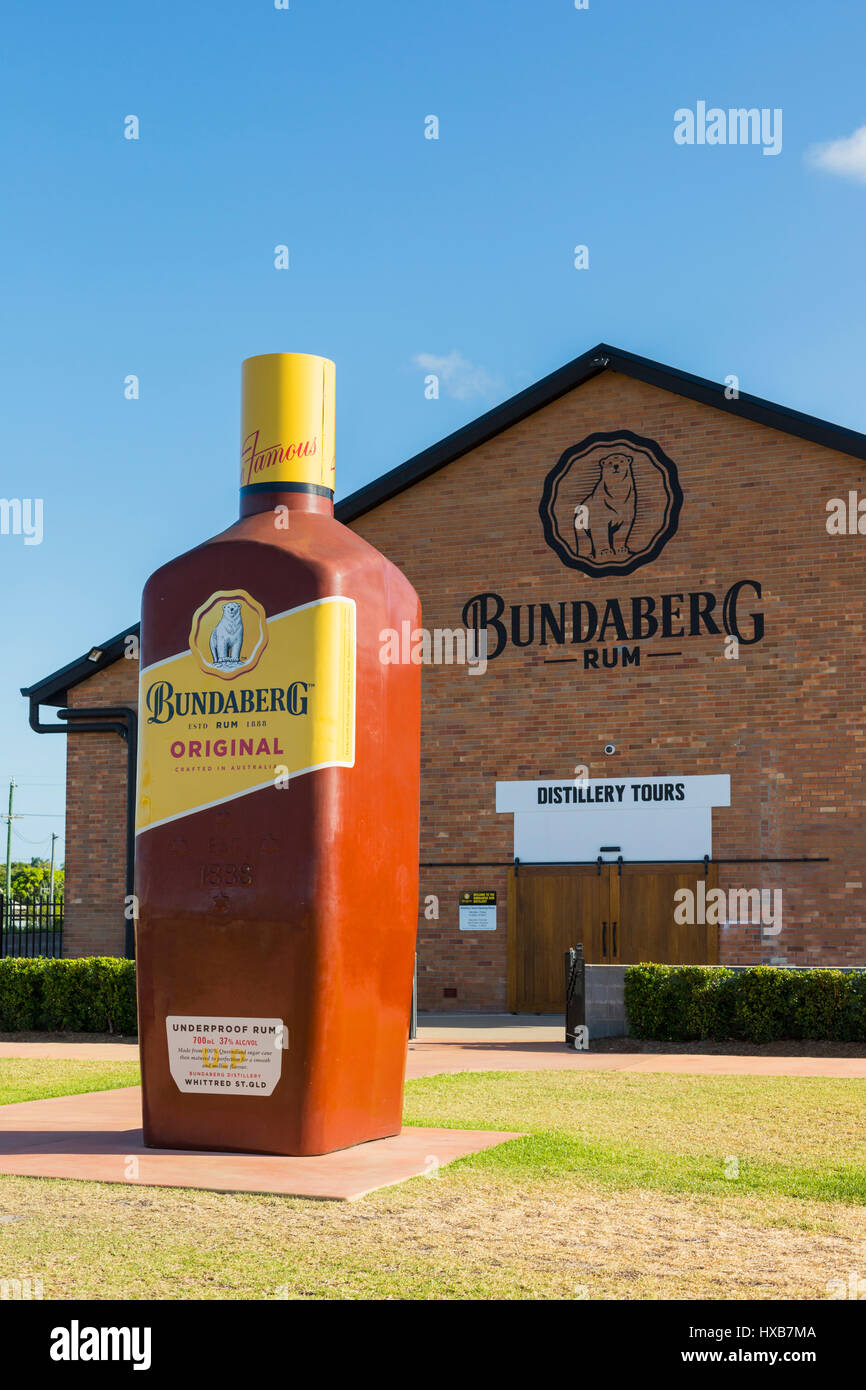 A giant version of Australia's iconic Bundy Rum bottle in front of the Bundaberg Rum distillery visitor centre.  Bundaberg, Queensland, Australia Stock Photo