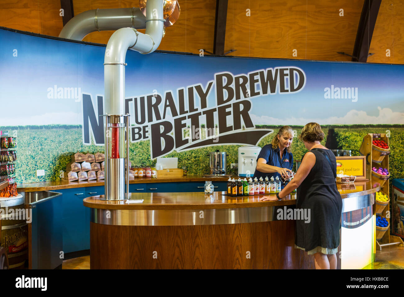 Visitor taste tasting at Bundaberg Barrel.  Bundaberg, Queensland, Australia Stock Photo