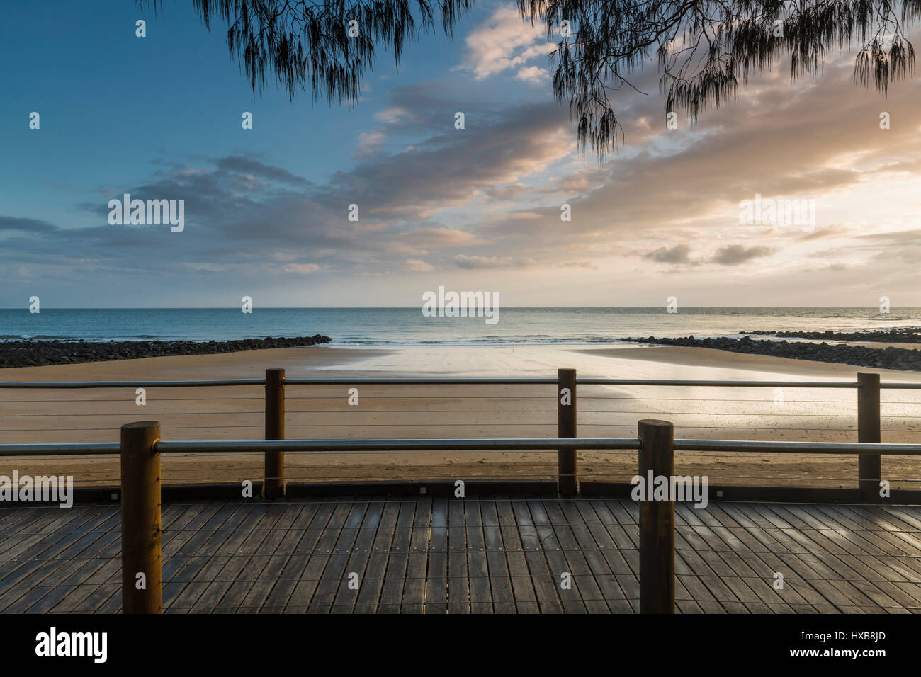 Dawn along the Esplanade boardwalk at Bargara Beach, Bundaberg, Queensland, Australia Stock Photo