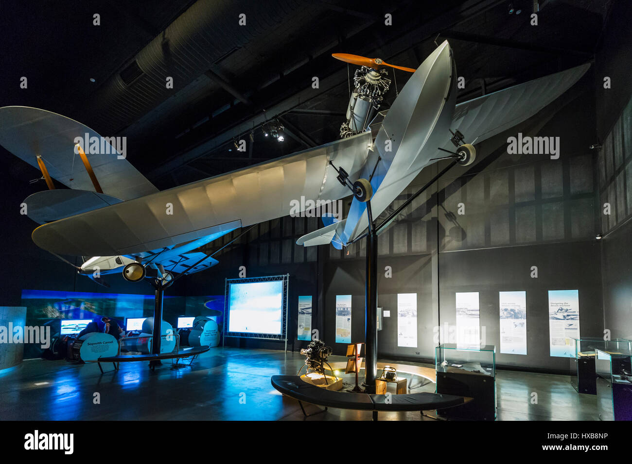 Replica aircraft including the Ibis and interactive exhibits inside the Hinkler Hall of Aviation.  Bundaberg, Queensland, Australia Stock Photo