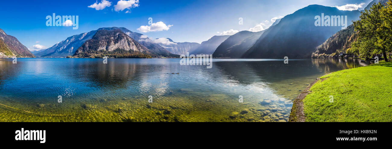 Crystal clear blue water in a mountain lake hi-res stock photography ...