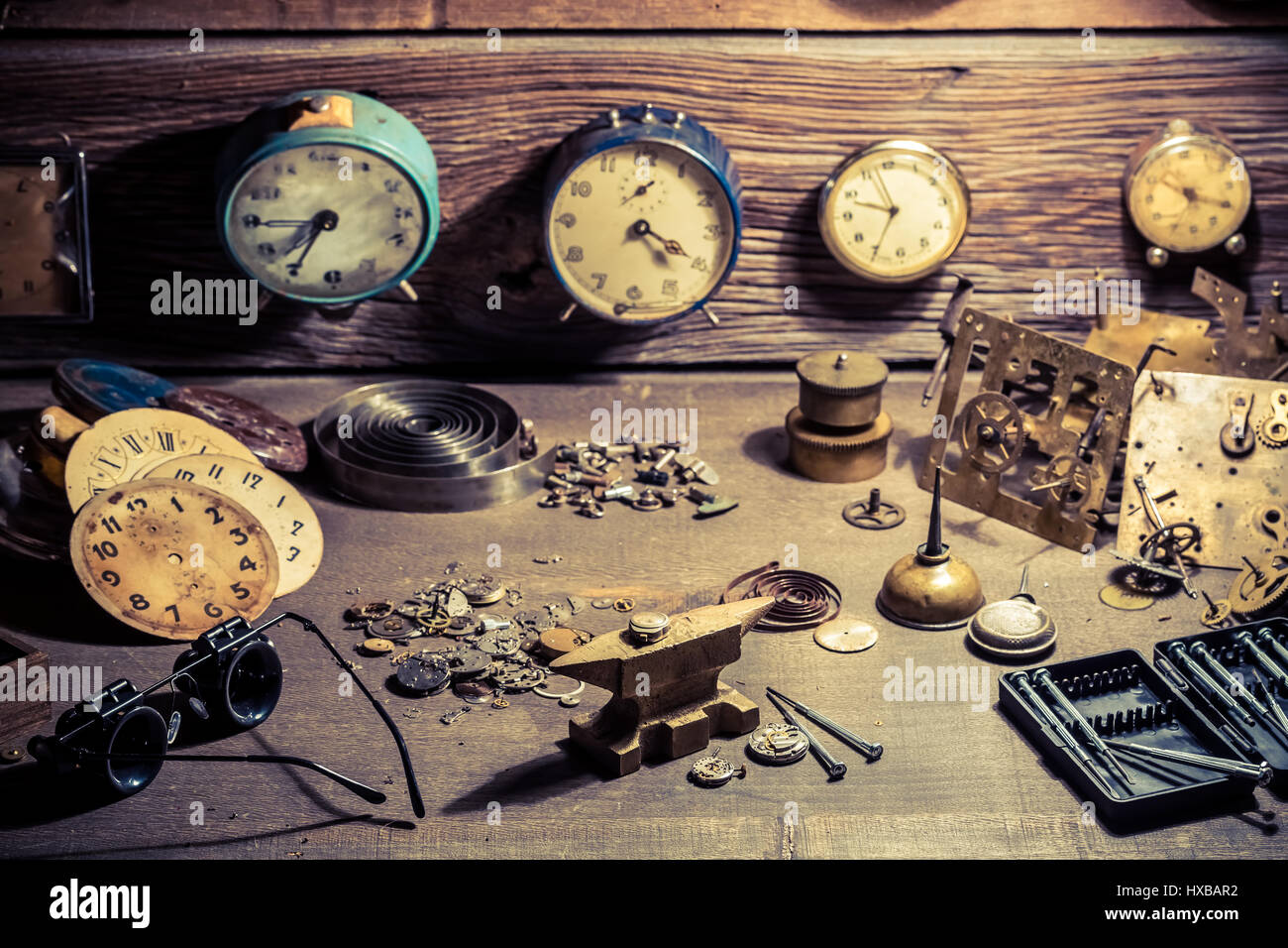 Watchmaker's room with clocks to repair Stock Photo Alamy