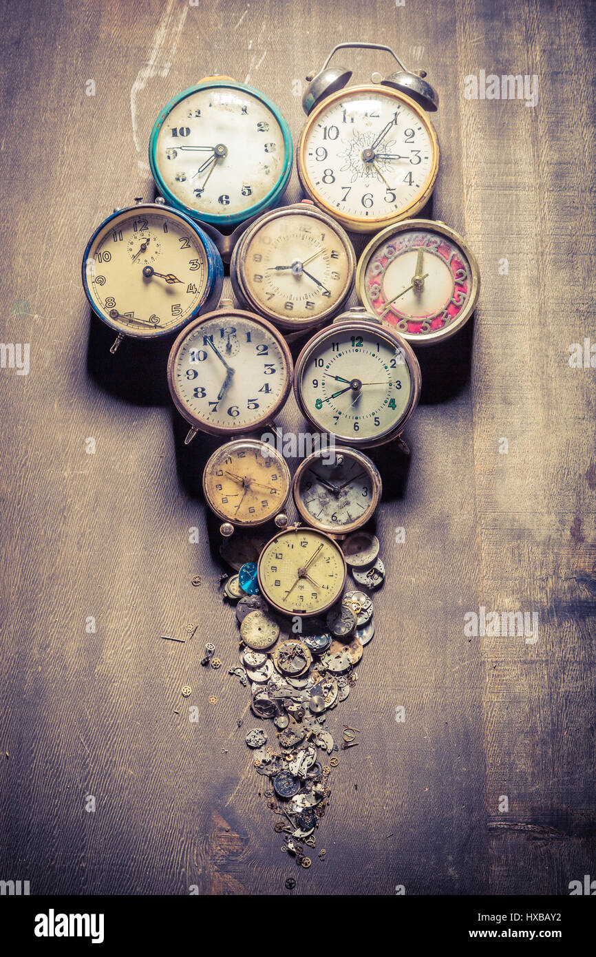 Damaged clocks in pile Stock Photo Alamy