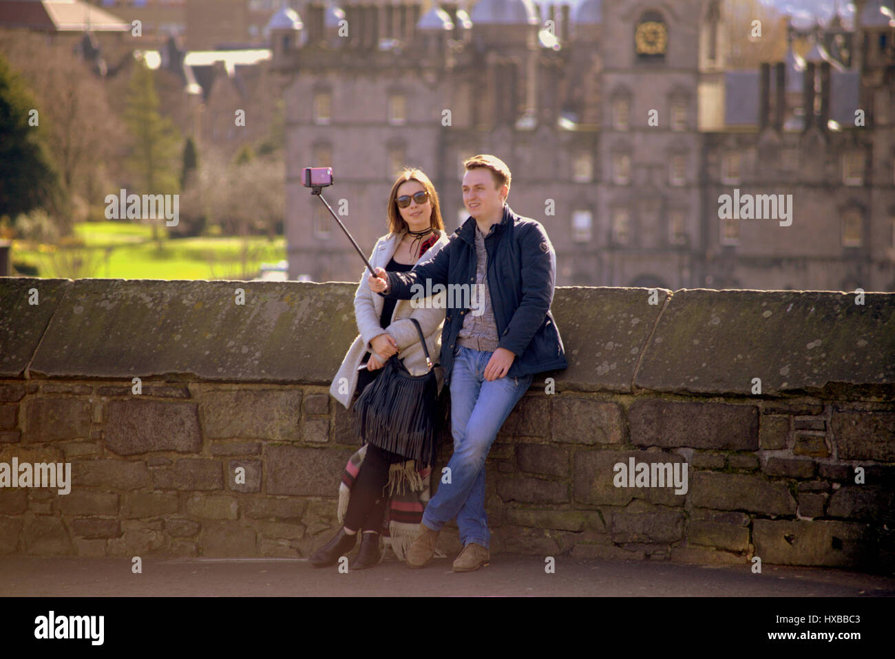 Edinburgh castle interior ramparts crowds of tourists enjoy selfie selfies sellfys mobile phones exploring castle walls Stock Photo