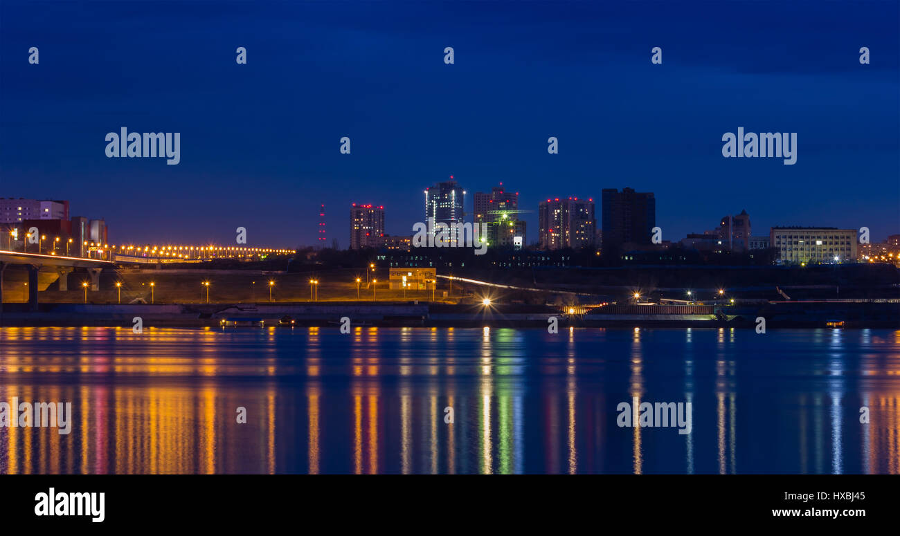 Reflection lights of the night city in a big river Stock Photo - Alamy