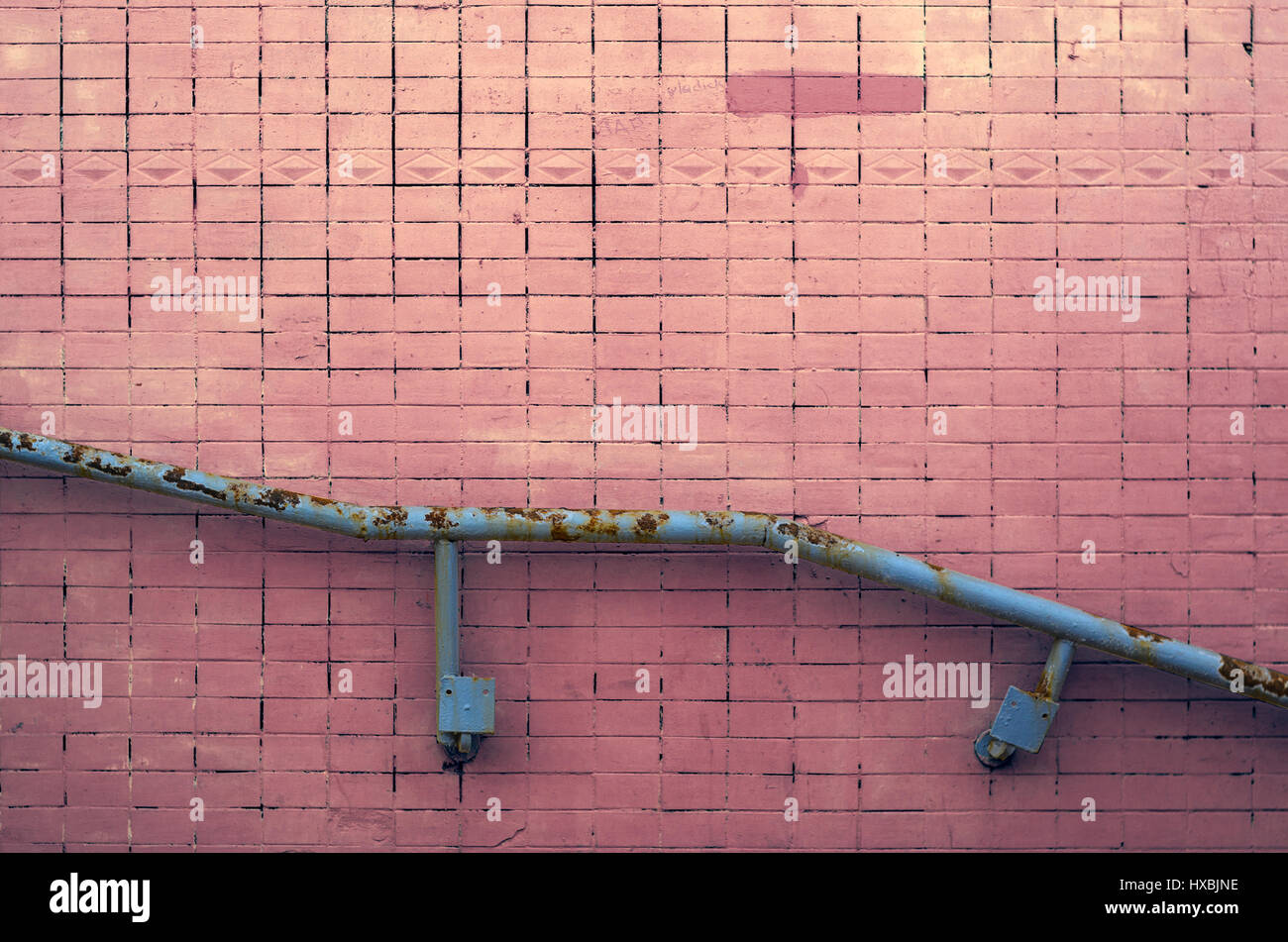 Painted Tile Wall Texture with Metal Railing for Background or Copy ...