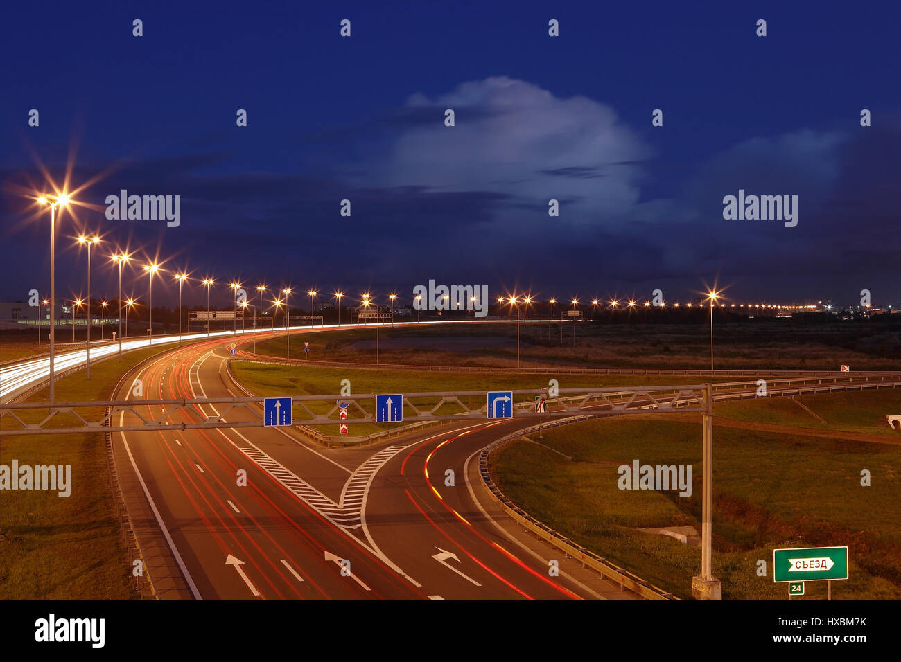 ST-PETERSBURG, RUSSIA - SEPTEMBER 17: Ringway St Petersburg, September 17, 2009. The mast lighting on the night road. Electric lights in the night hig Stock Photo