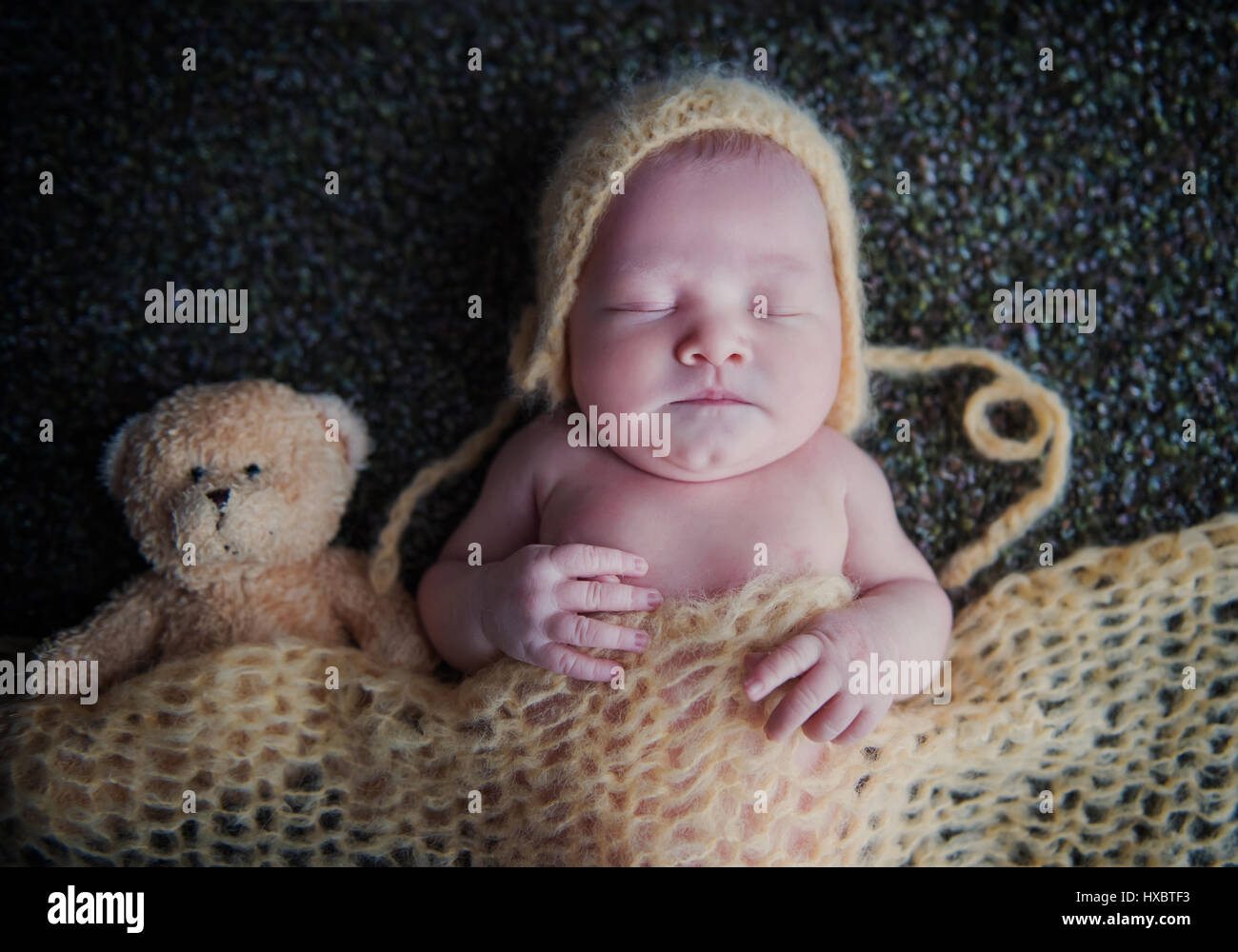 Newborn baby in a cap Stock Photo