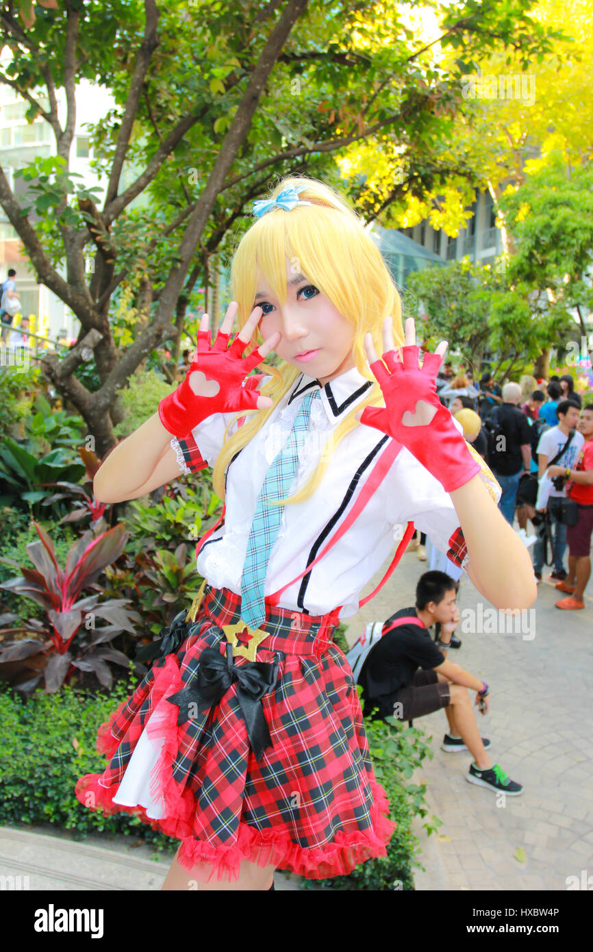 Bangkok - Dec 28: An unidentified Japanese anime cosplay pose in COSCOM ...