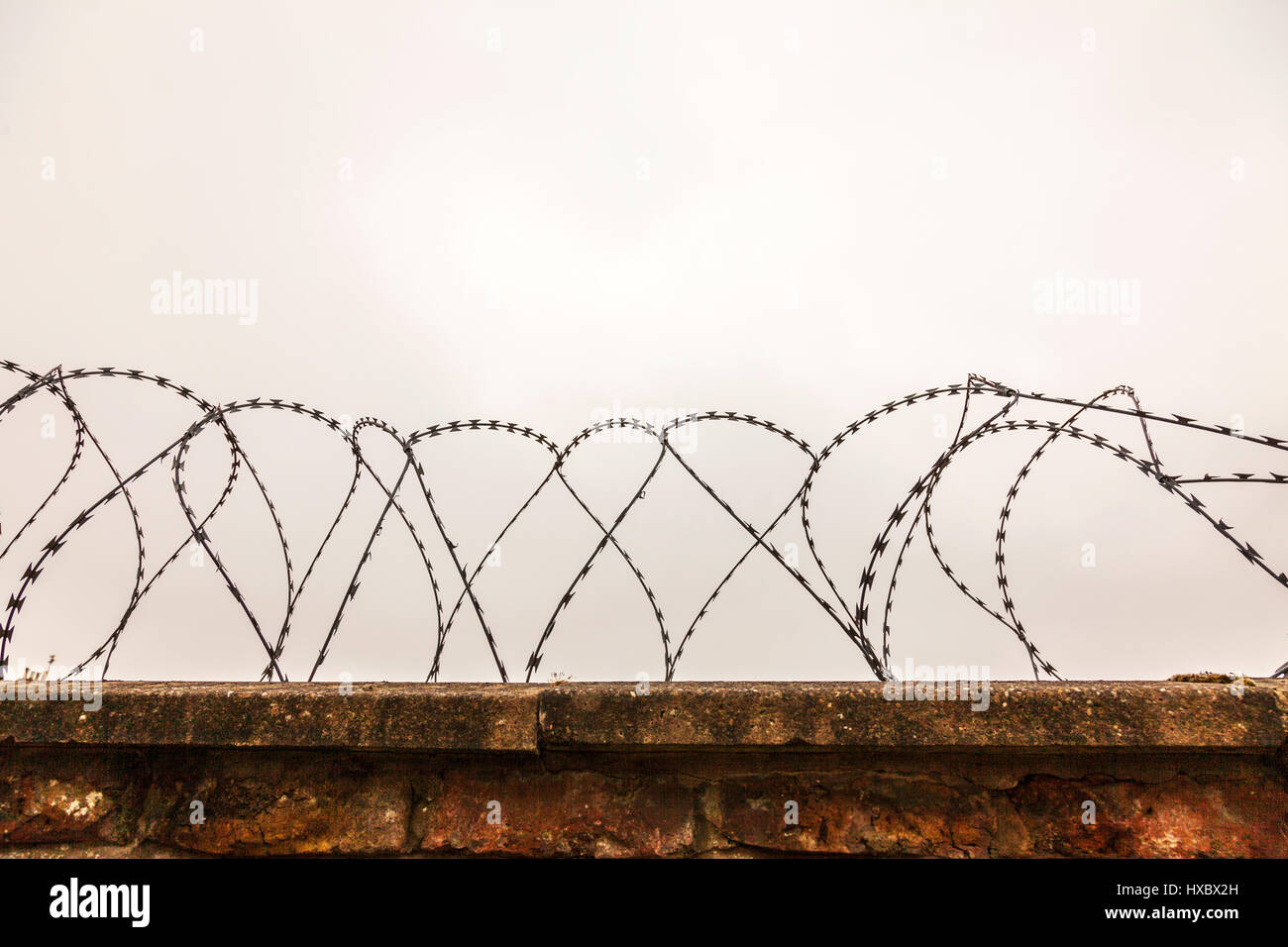 Razor wire security fence protection from burglars secure wall prison