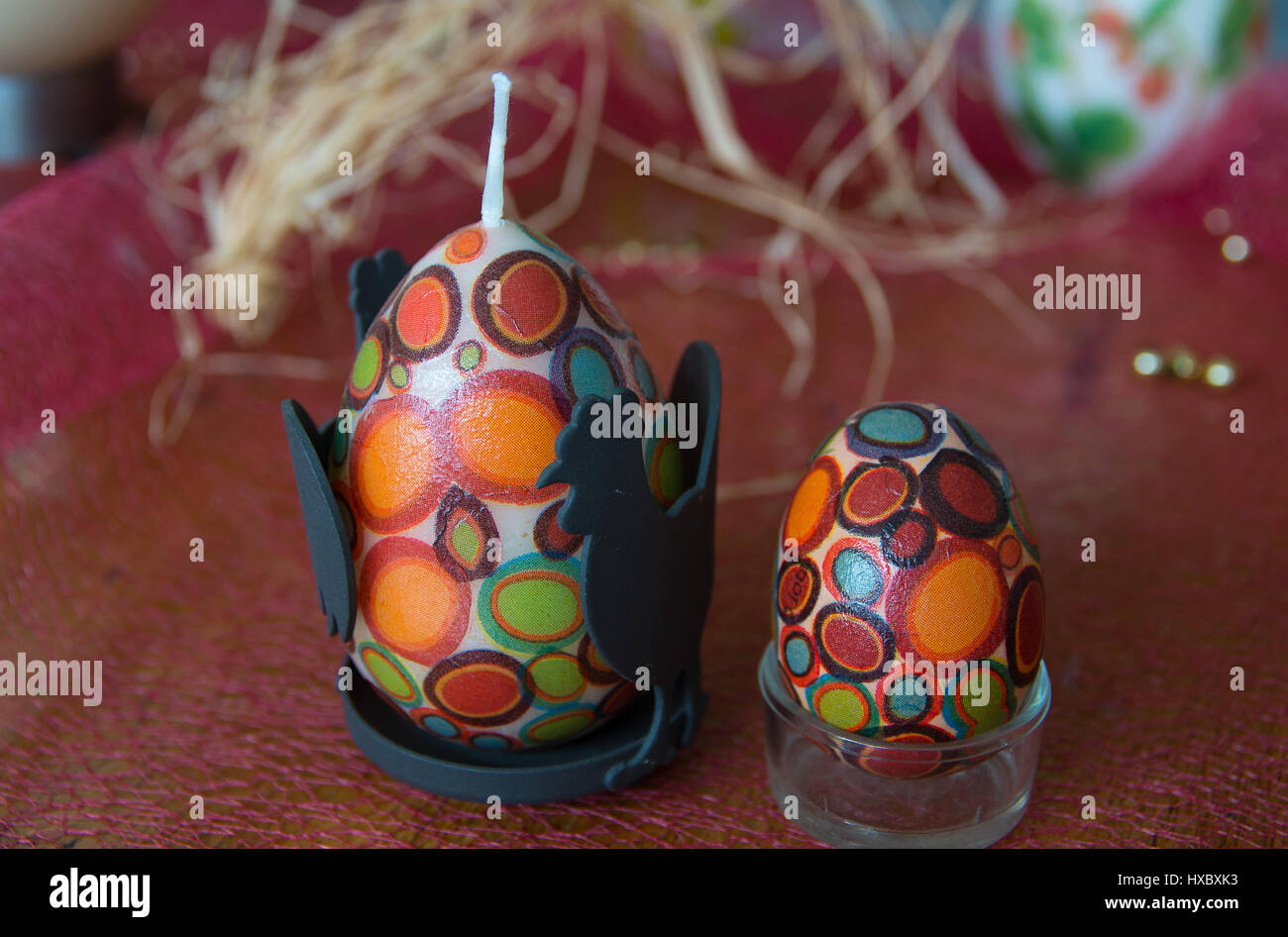 Easter eggs and candles. Stock Photo