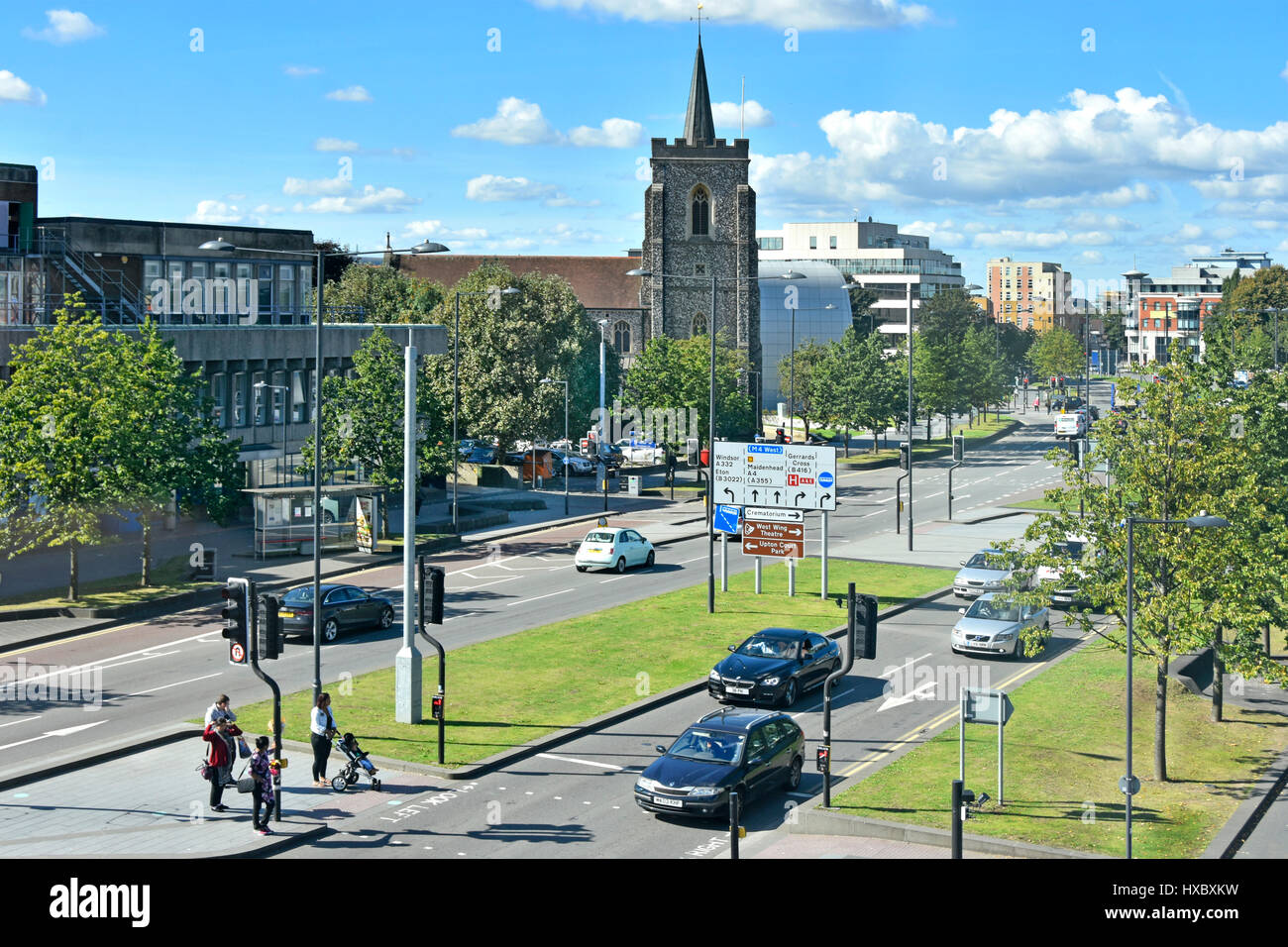 Slough town UK Berkshire looking down on road signs multi lane junction ahead & pedestrian crossing traffic lights dual carriageway road Stock Photo