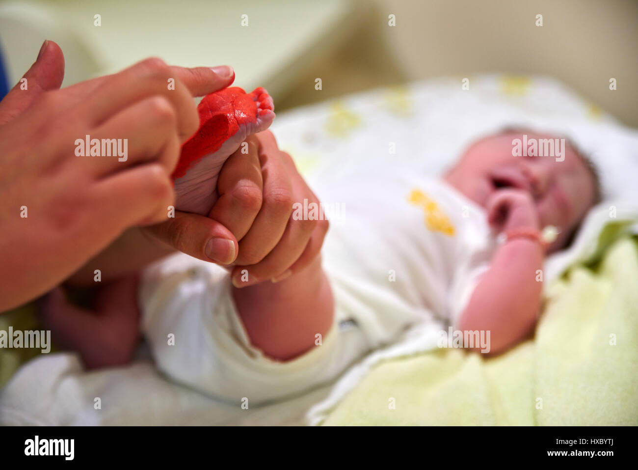 newborn making footprint Stock Photo Alamy