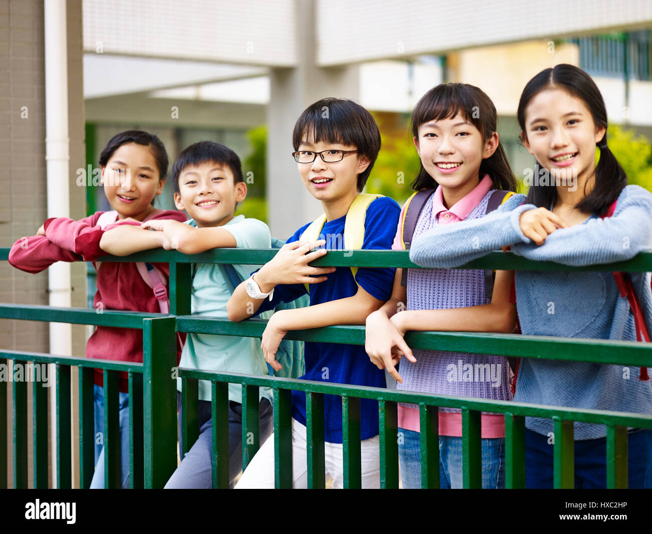 portrait of a group of happy and smiling elementary school students. Stock Photo