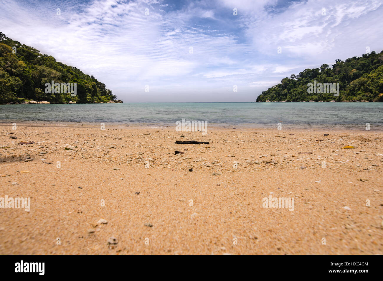 A low angle shot of an empty and beautiful Monkey Bay on Tioman Island off the coast of Malaysia. It was quite a stunning but hard work trek through t Stock Photo