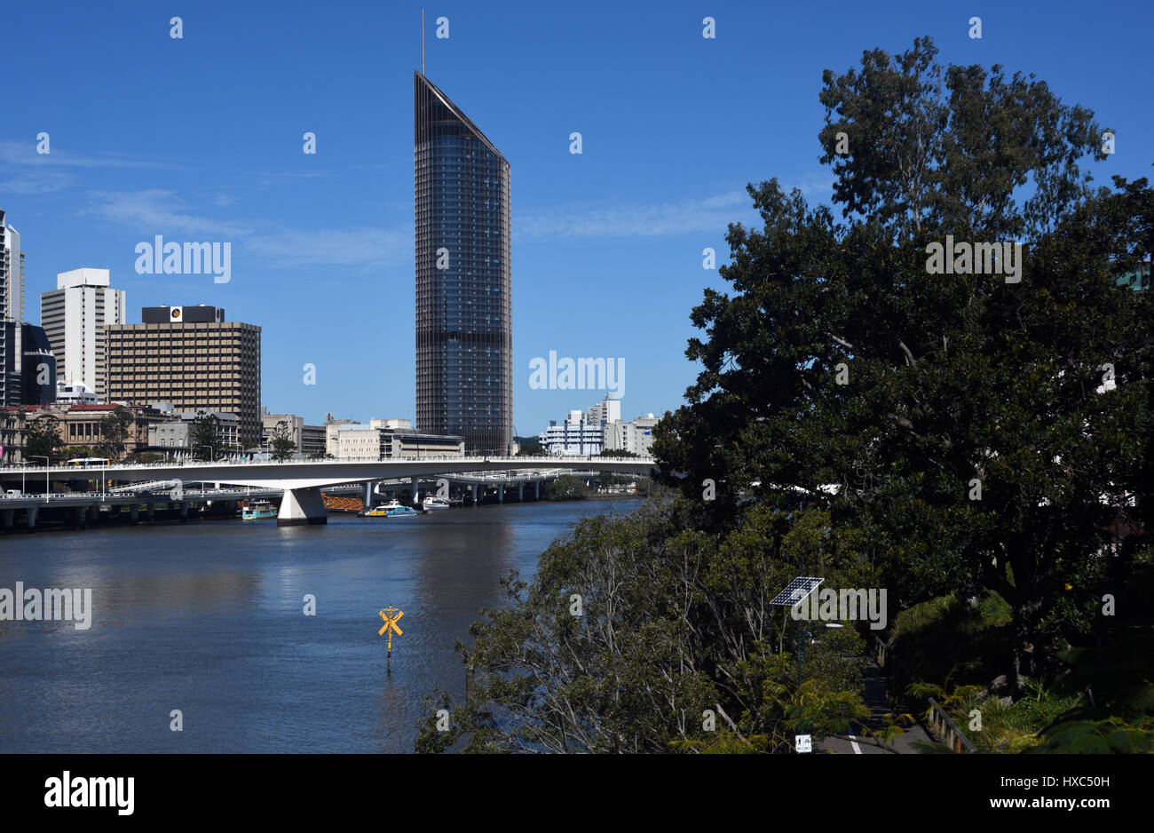 Brisbane, Australia: Old (left) and new (right) Queensland state government buildings overlooking Brisbane River and Victoria Bridge. Stock Photo