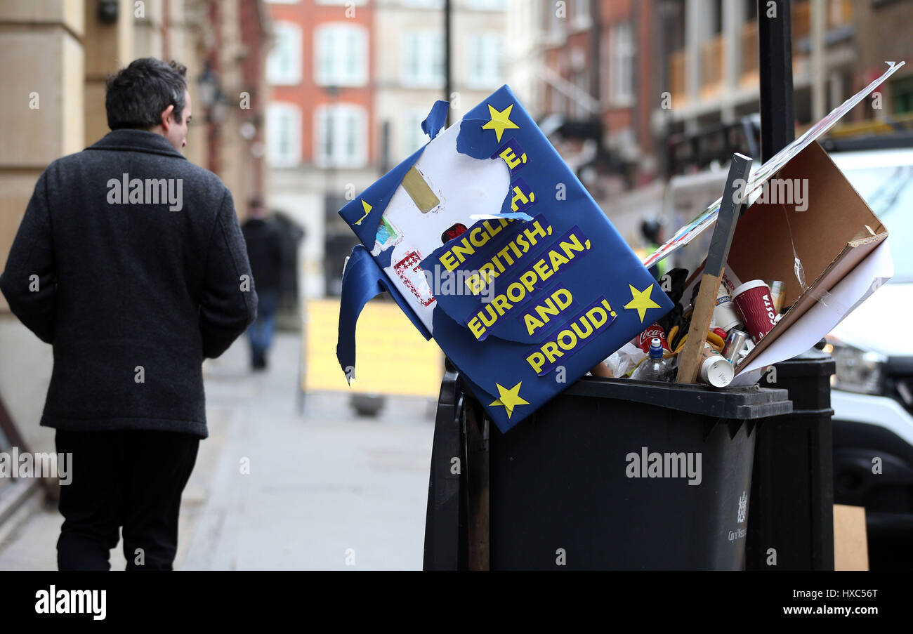 Placards extolling the virtues of remaining in the EU lie discarded in a waste bin after a pro-EU march on Saturday on Queen Anne's Gate, London. Stock Photo